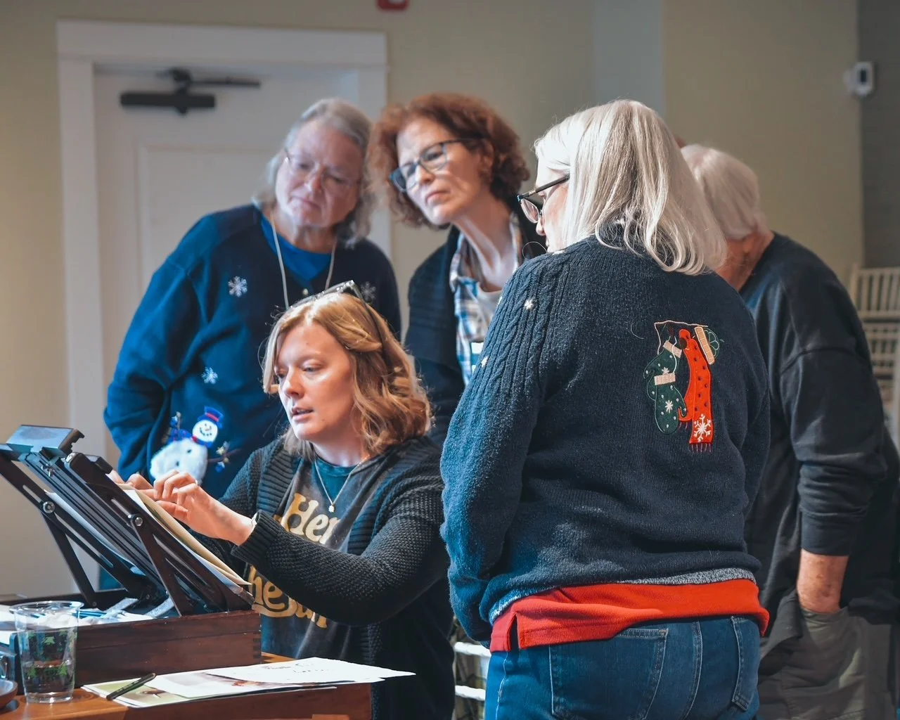 students watching artist paint.JPG