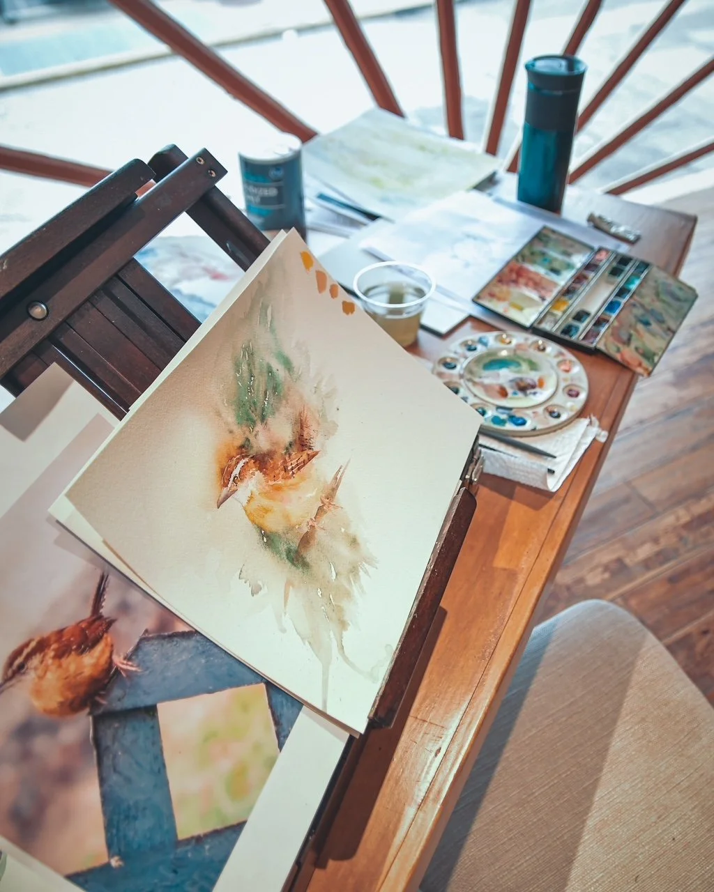 watercolor painting on easel.JPG