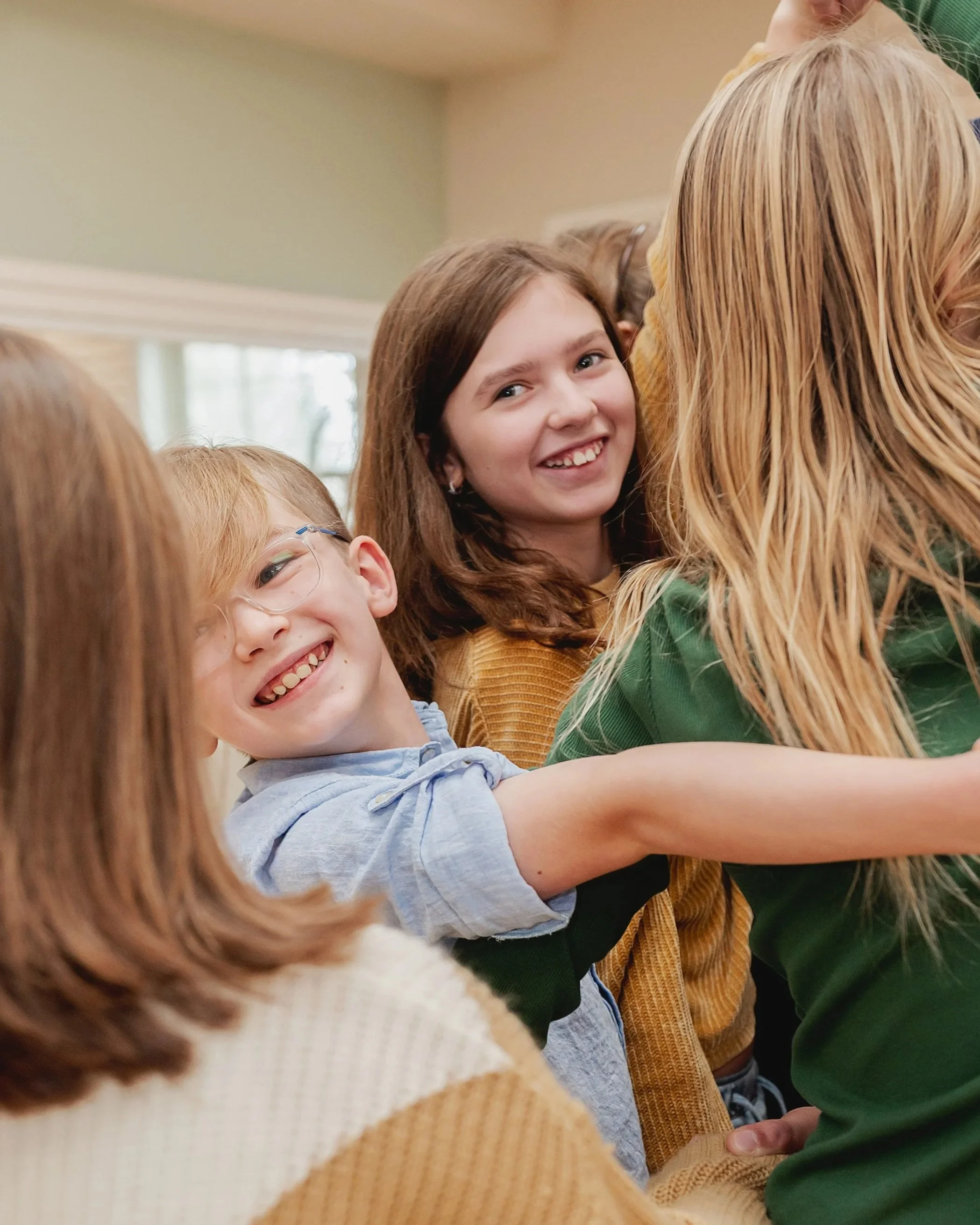 group hug, students smiling