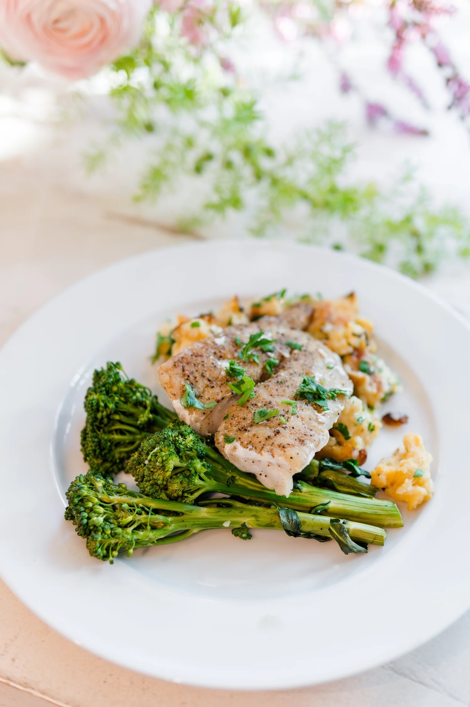 Gulf fish with broccolini, plated by Chef Jojo at a private dinner on 30A