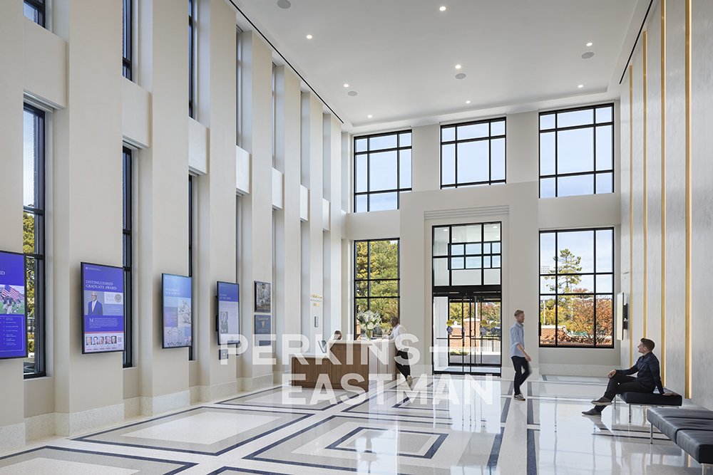 USNA - Fluegel Alumni Center_Photo Int Lobby 2 w People_Photograph by Andrew Rugge - Copyright Perkins Eastman.jpg