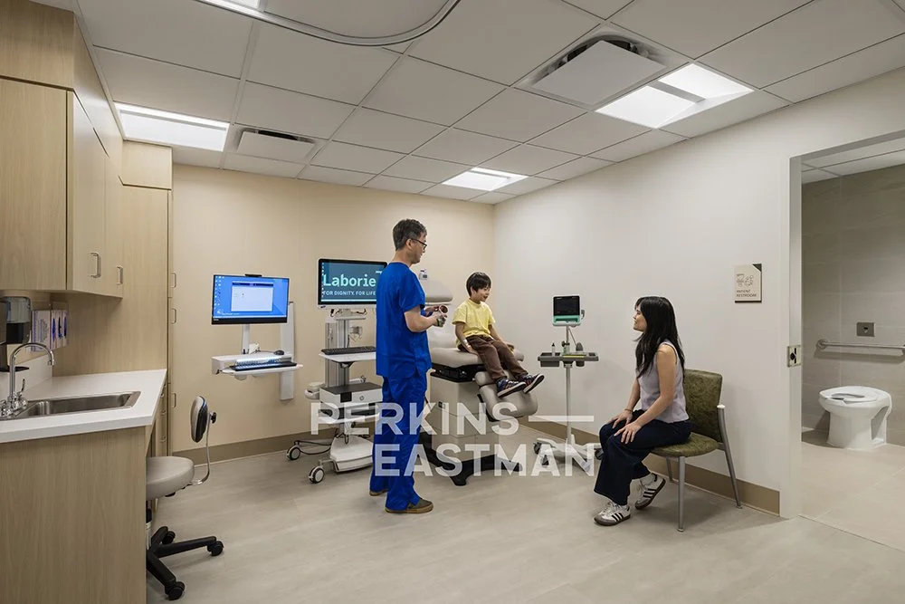 Northwell Health - Pediatric Ortho & Urology_Photo Int Exam Room 1 w People_Photograph by Andrew Rugge - Copyright Perkins Eastman.jpg