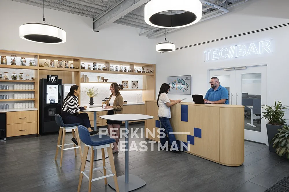 Confidential Pharma Company - HQ_Photo Int Main St Tech Bar w People_Photograph by Andrew Rugge - Copyright Perkins Eastman.jpg