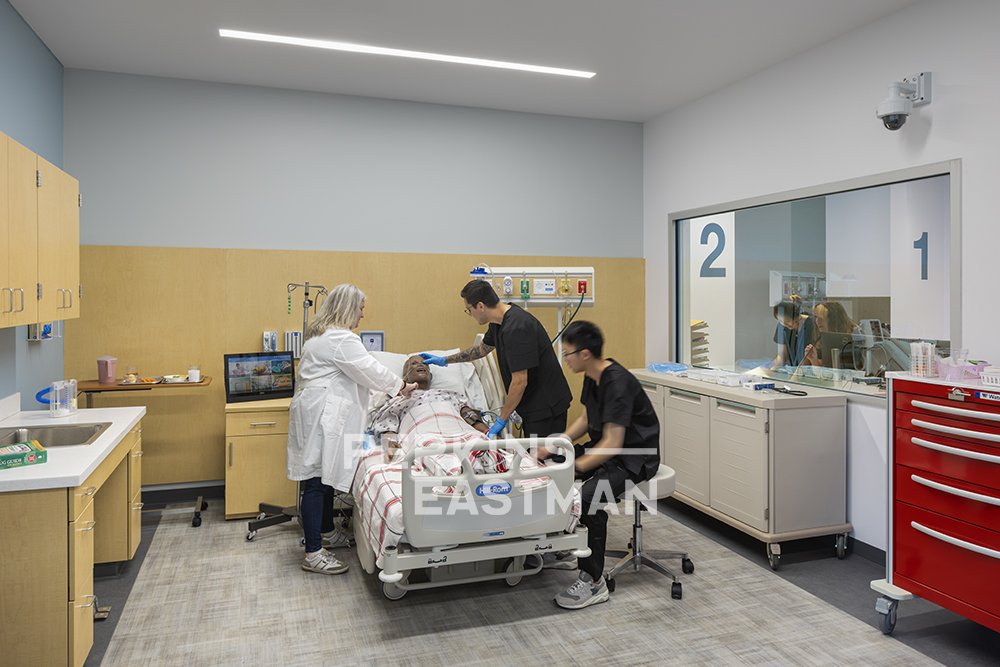 SJE CCD - EVC - Sequoia Nursing_Photo Int Lab Simulation Room w People_Photograph by Andrew Rugge - Copyright Perkins Eastman.jpg