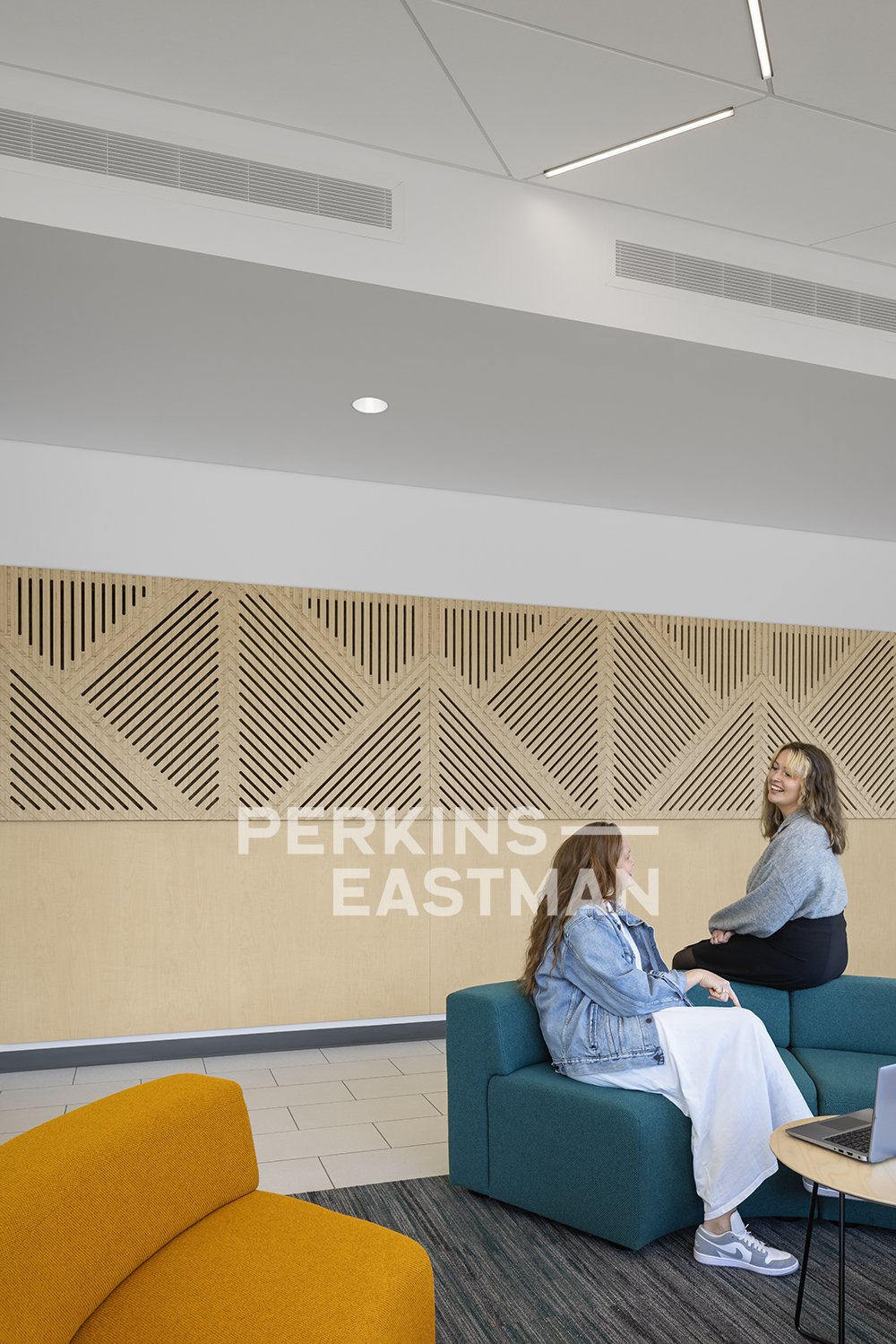 SJE CCD - EVC - Sequoia Nursing_Photo Int Lobby Detail w People_Photograph by Andrew Rugge - Copyright Perkins Eastman.jpg