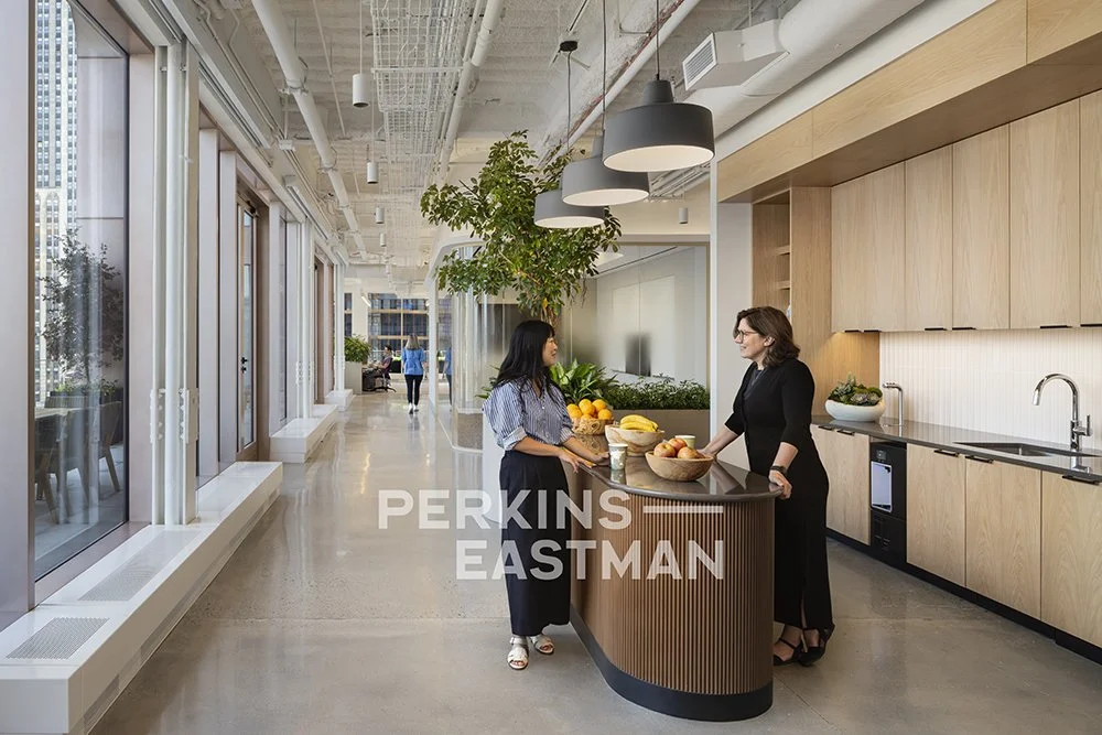 Confidential Asset Mgmt - NYC_Photo Int Pantry w People_Photograph by Andrew Rugge - Copyright Perkins Eastman.jpg