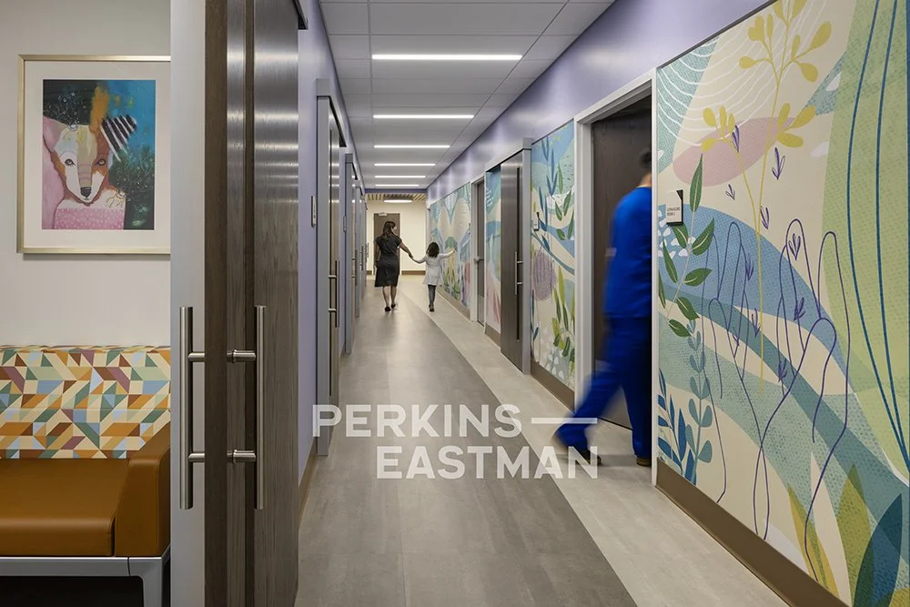 Northwell Health - Pediatric Ortho & Urology_Photo Int Patient Corridor Middle w People_Photograph by Andrew Rugge - Copyright Perkins Eastman.jpg