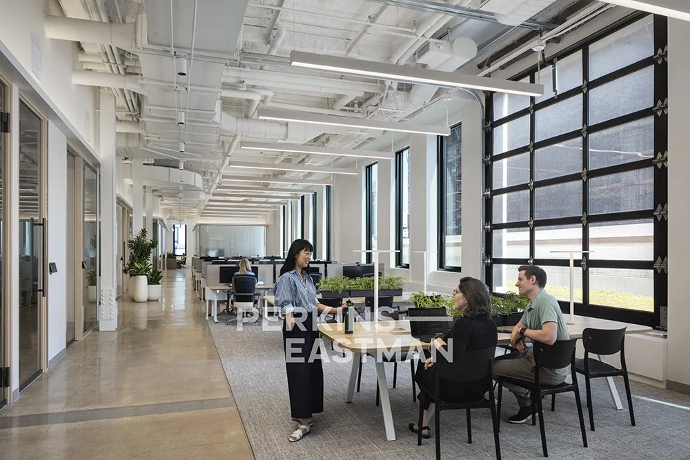 Confidential Asset Mgmt - NYC_Photo Int Workstations 3 w People_Photograph by Andrew Rugge - Copyright Perkins Eastman.jpg