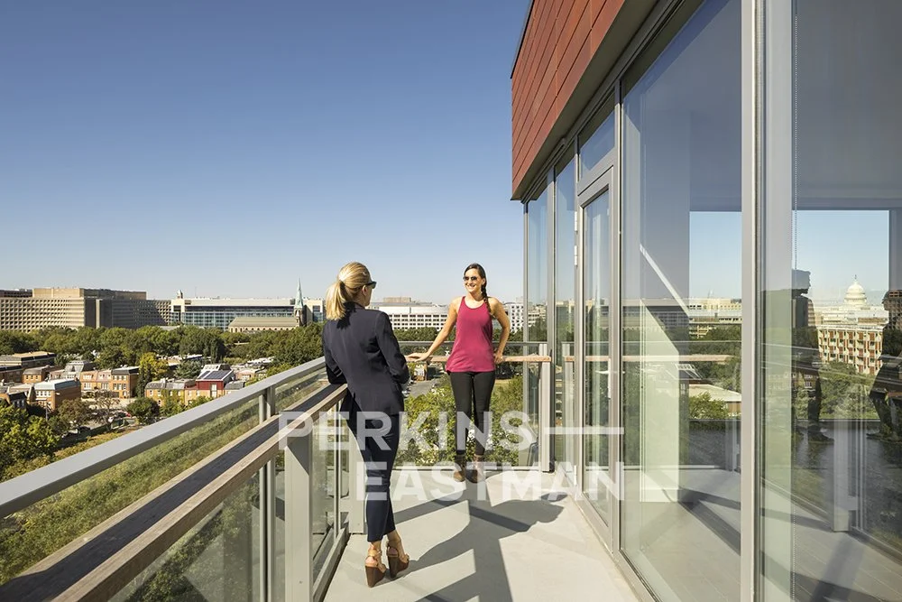 Eliot on 4th_Photo Ext Unit Balcony w People_Photograph by Sarah Mechling - Copyright Perkins Eastman.jpg