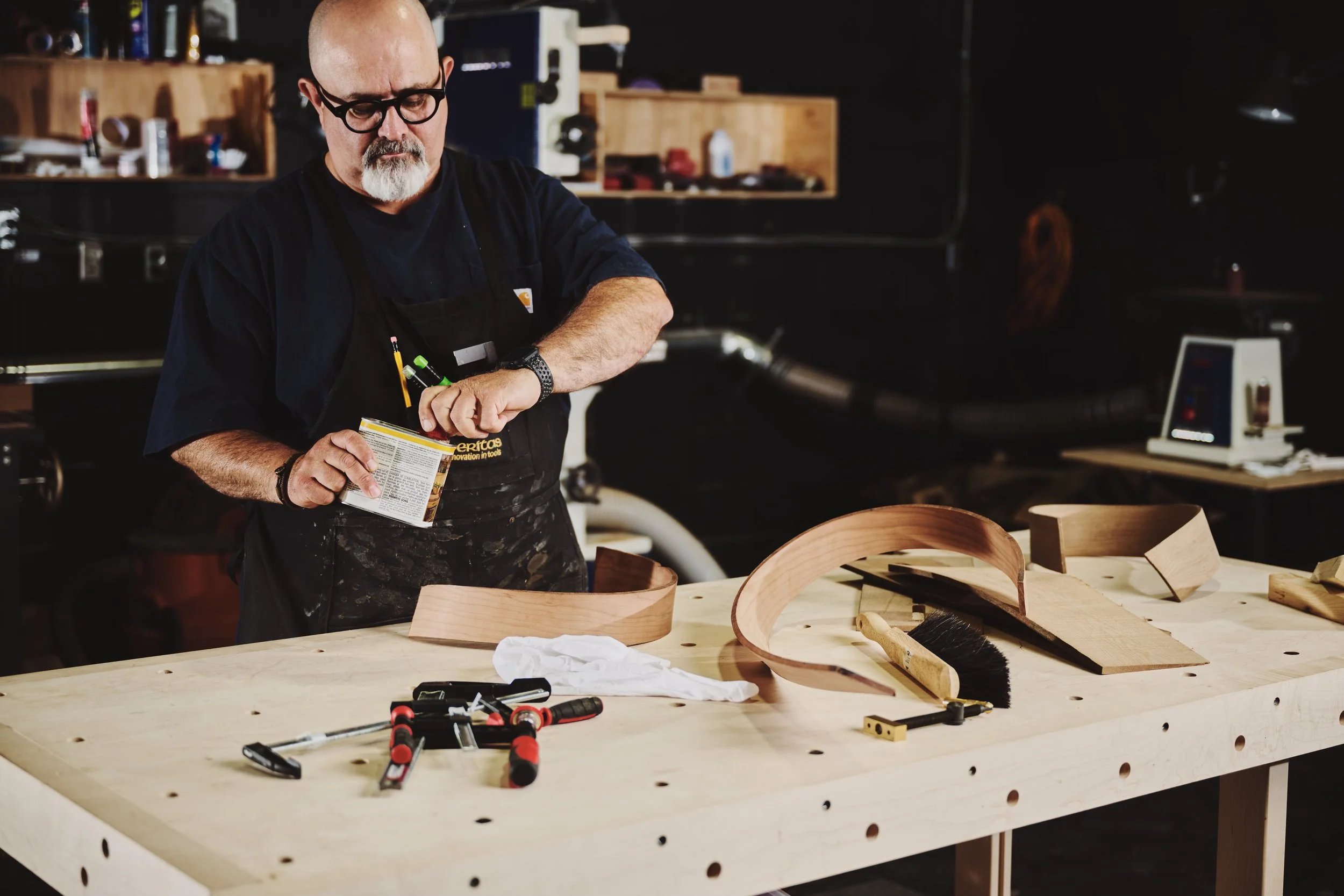 An artisan working on creating one of our pendant light