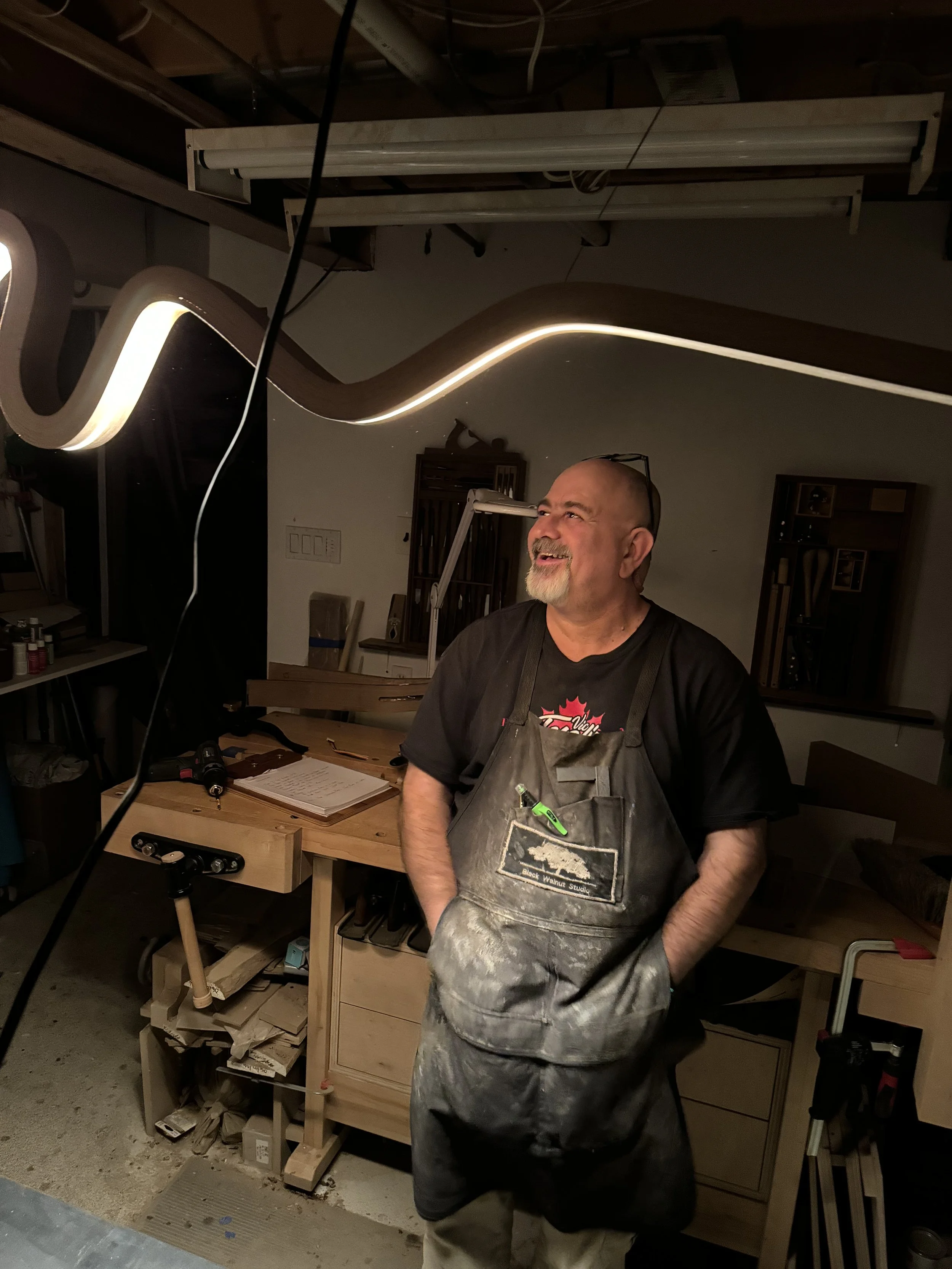 Image of Steve under our first BENDEE light fixture