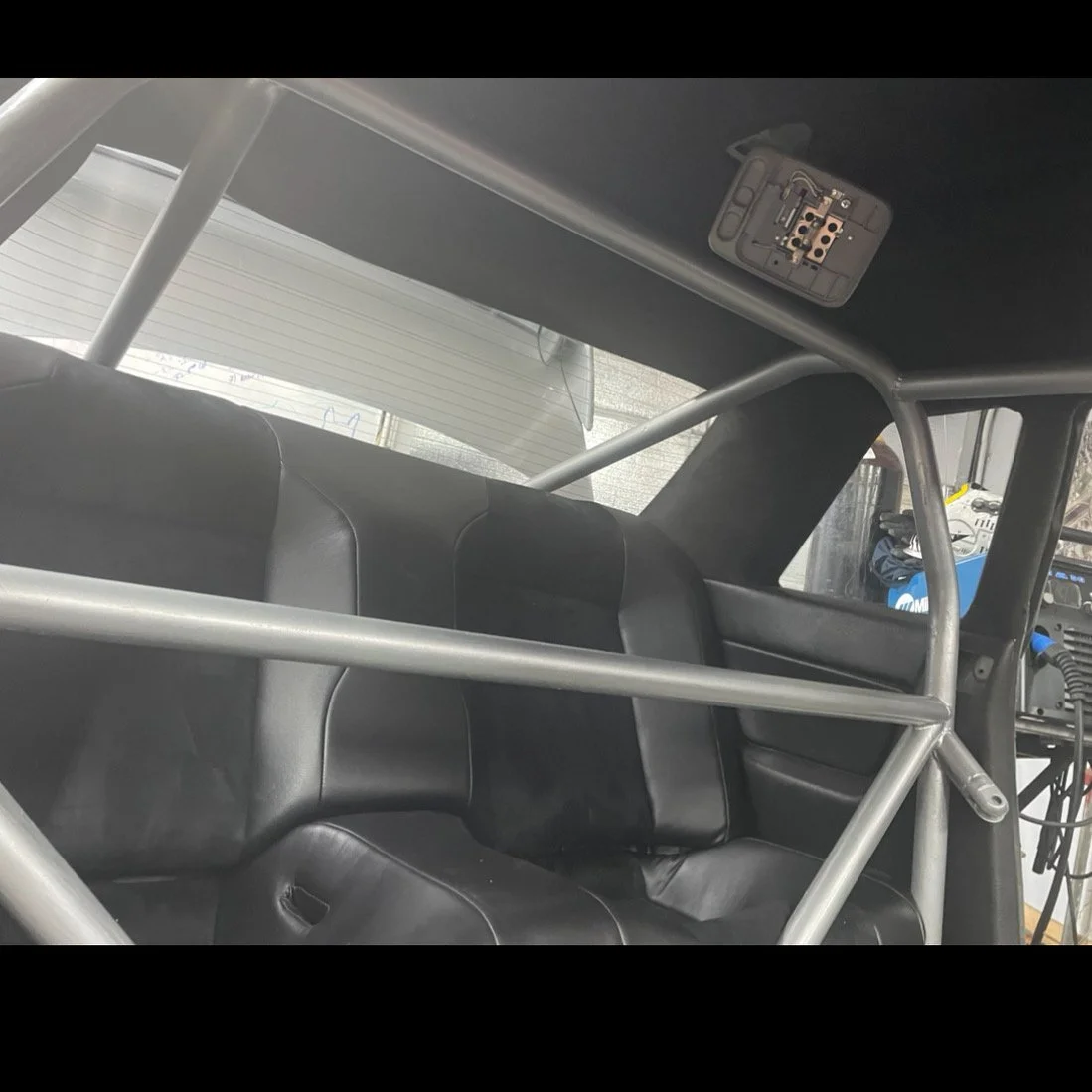 With 1000hp the car requires a roll cage. Using NHRA guide lines I fabricated a roll cage out of 4130 chrommolly. This required the entire roll cage to be TIG welded to prevent altering the material properties.
