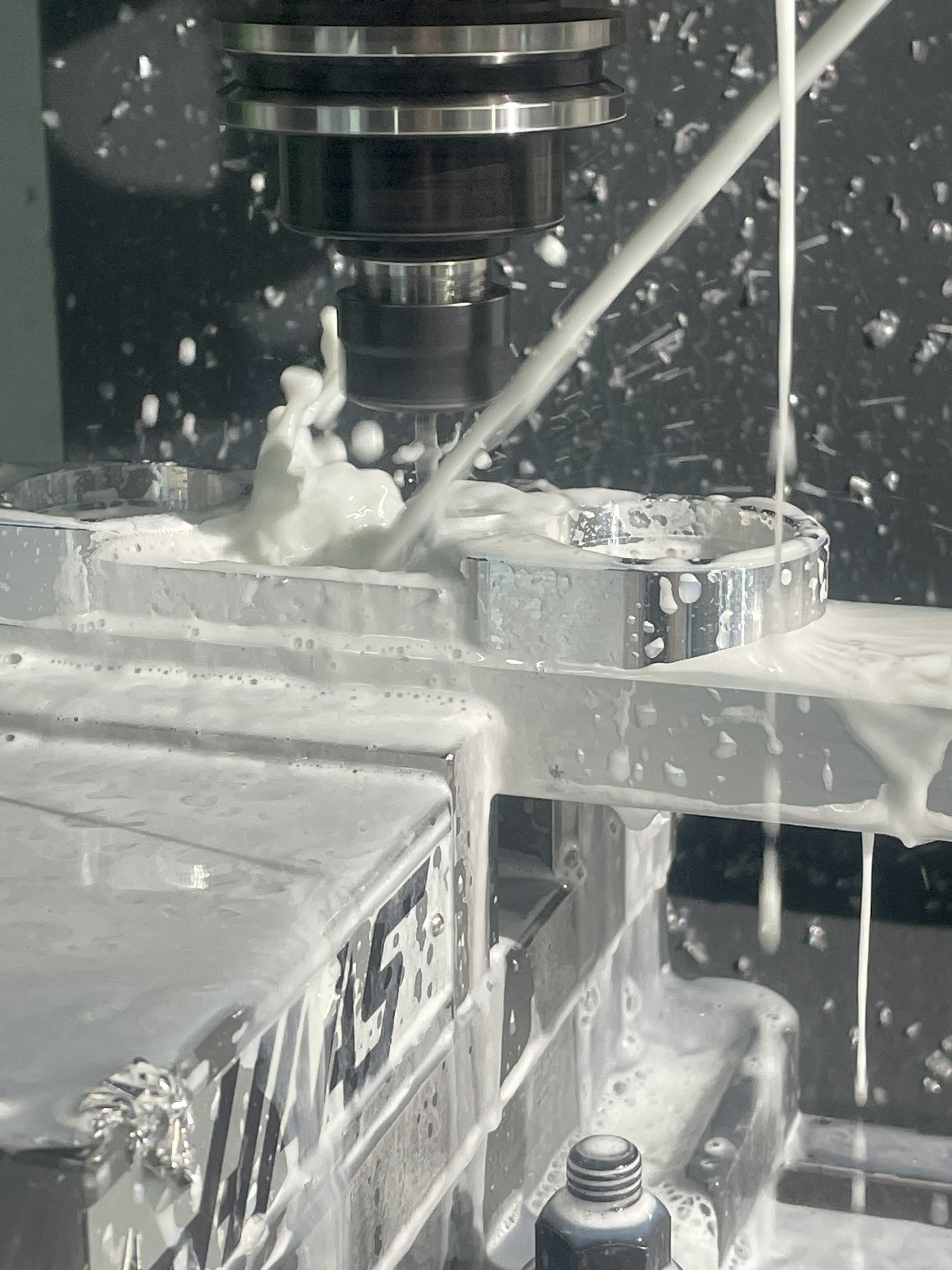 The machine that was used was a three axis so there would be a minimum of two operations. The origin was based off of cylinder one bore and the fixed jaw of the vice. This ensured that when the part was flipped over for operation two there would be