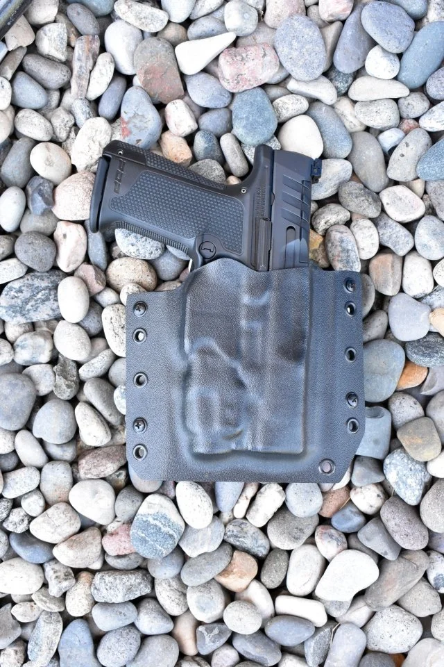  OWB Holster for a Walther PDP-F 4 with a Streamlight TLR--7 A 1.  