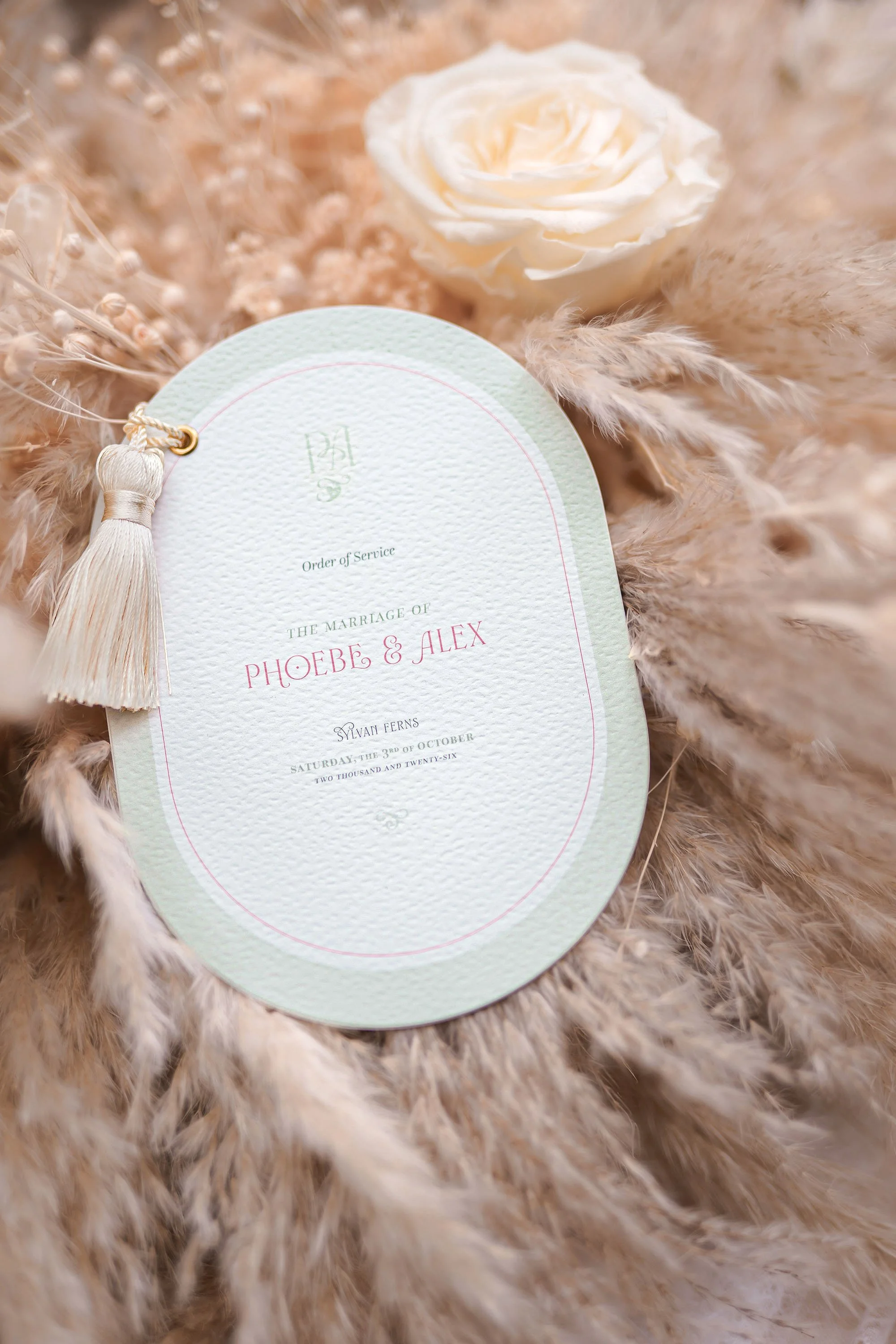 Woodland wedding ceremony booklet featuring Ever Entwined stationery and natural botanical styling.