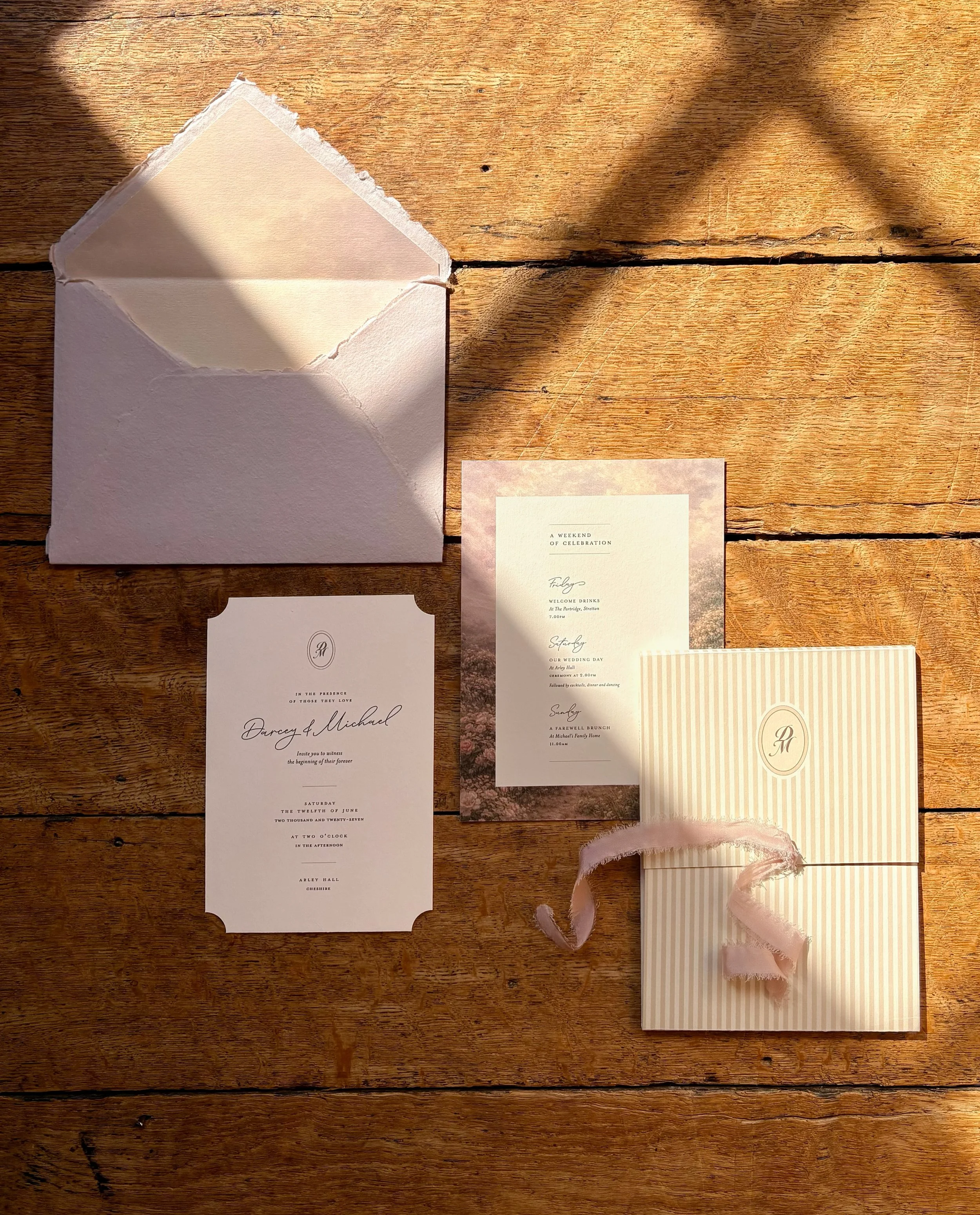 Inspired by the romance of @arleyhallandgardens in Cheshire, this invitation pairs dusky pinks, handmade paper and silk ribbon to create a gorgeously layered stationery suite.

One of my absolute favourite parts of creating wedding invitations is car