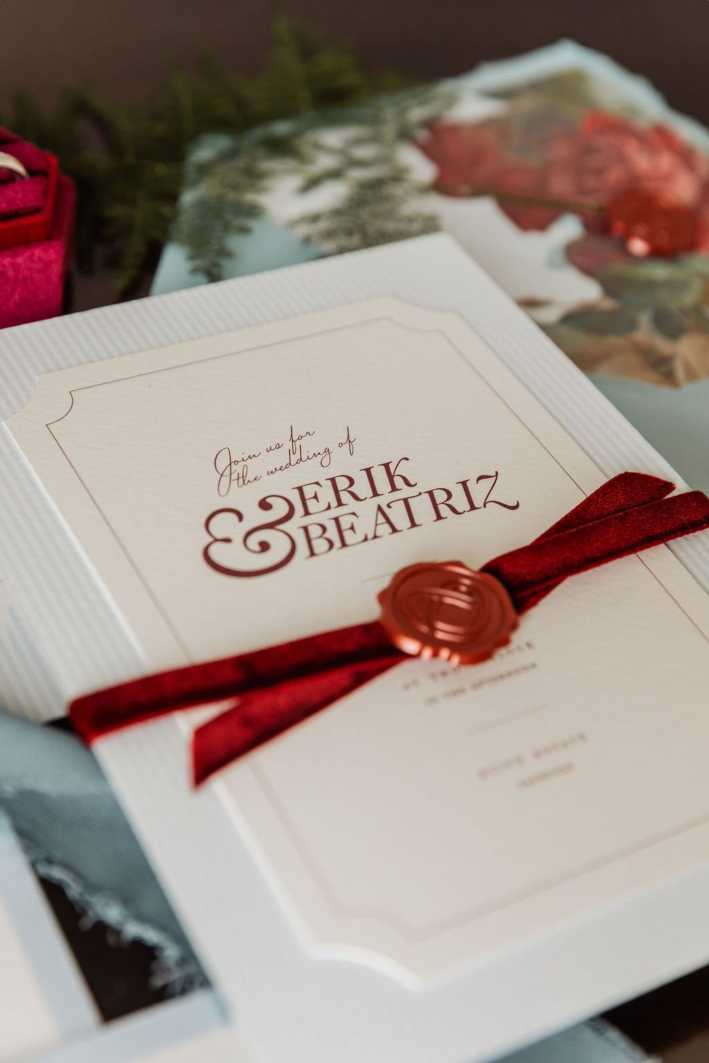 Luxury wedding invitation suite with vintages florals, powder blue and burgundy tones, handmade deckled paper, velvet ribbon and tassels. Designed by Carrie at Honey Bee Mine, and captured in the Scottish Highlands.