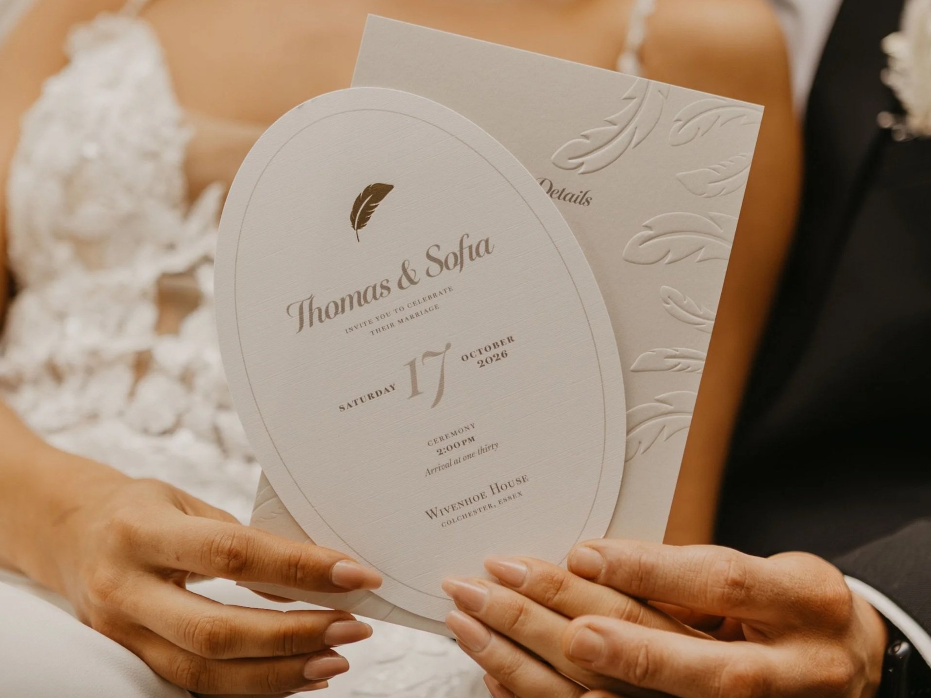 Editorial gold foil and embossed wedding invitation in ivory, mist and champagne.