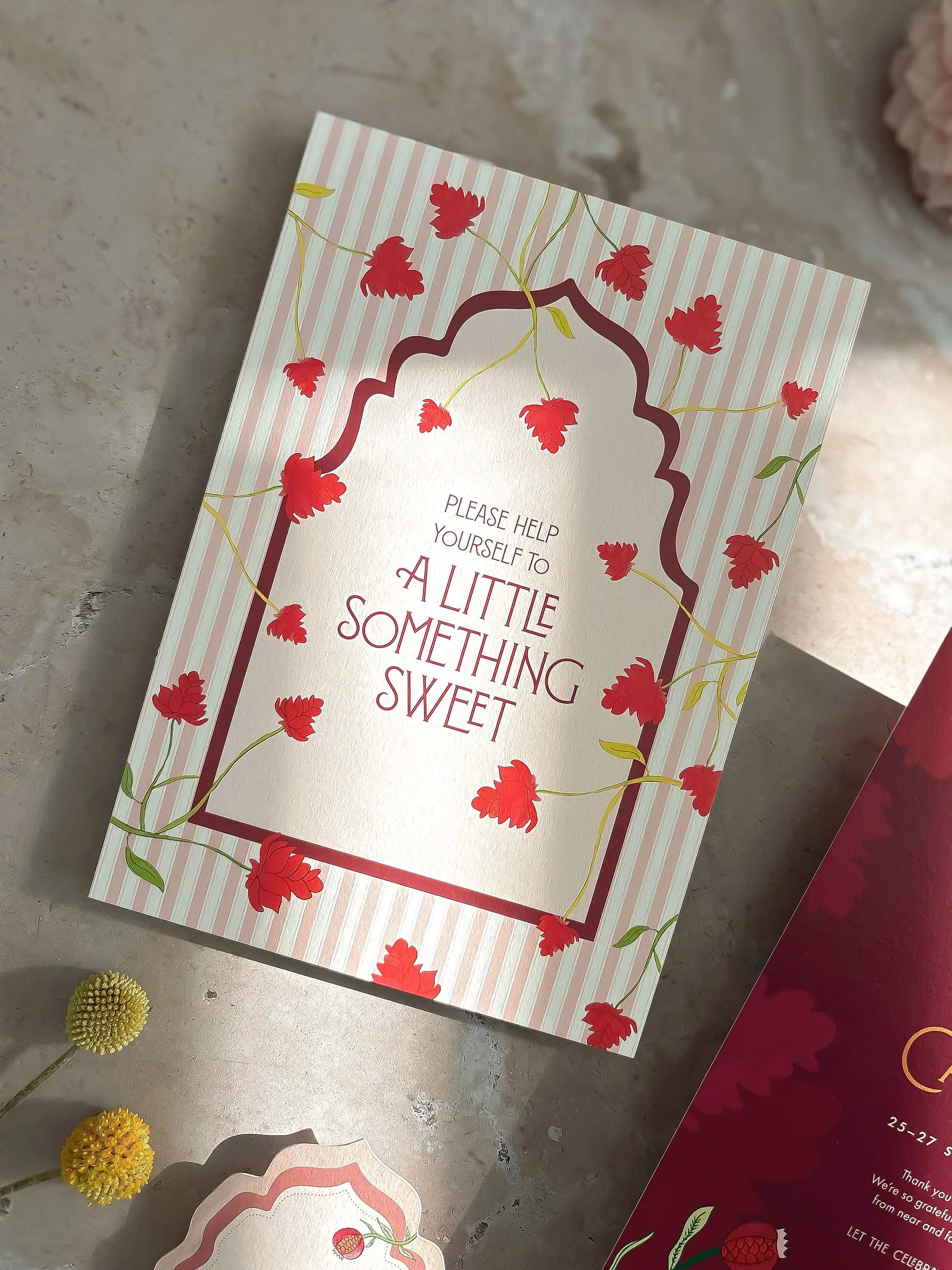 Bespoke wedding-day stationery designed to coordinate across multiple celebrations