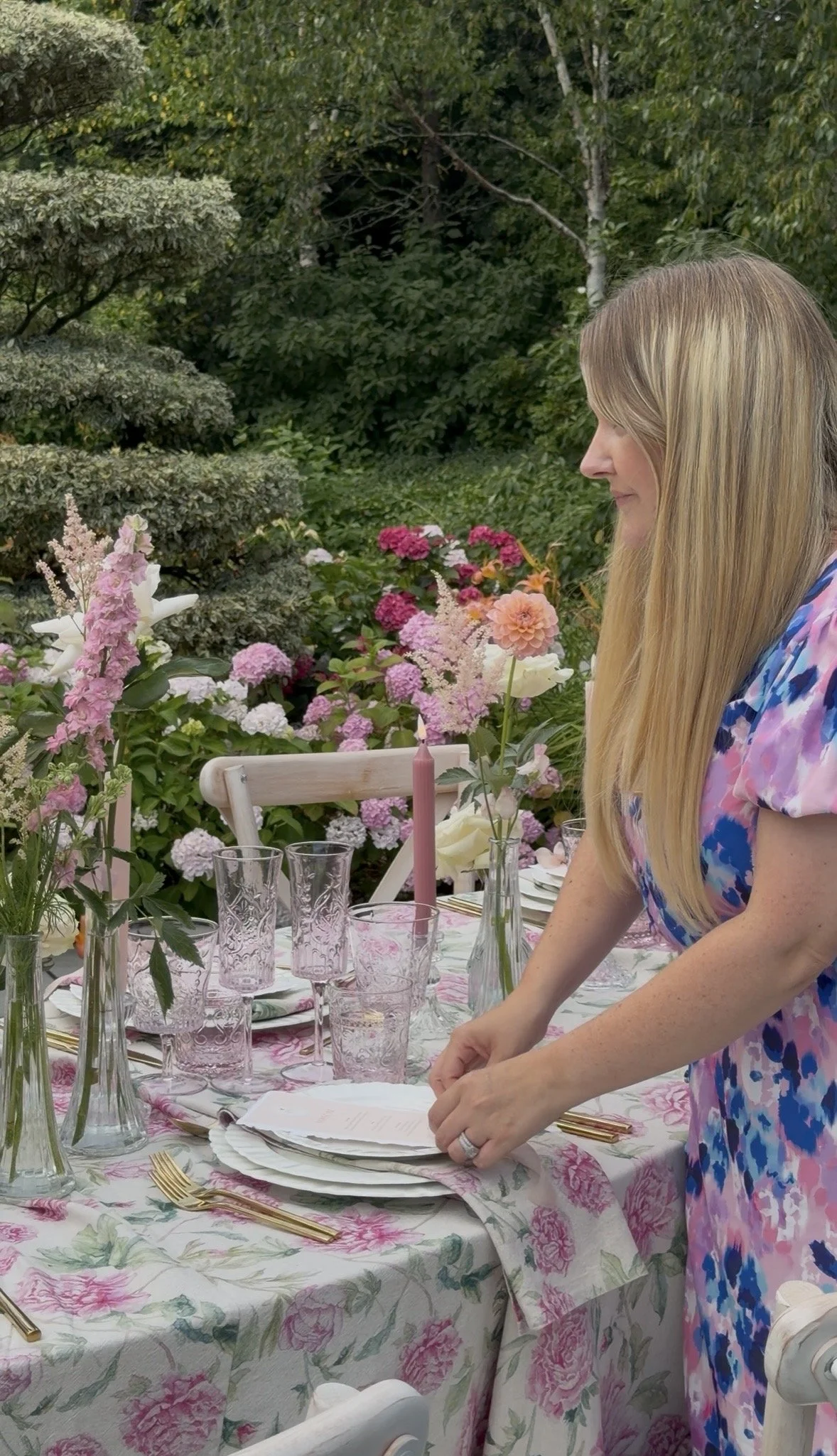 Carrie, the designer behind Honey Bee Mine stationery, placing menus at Styal Lodge