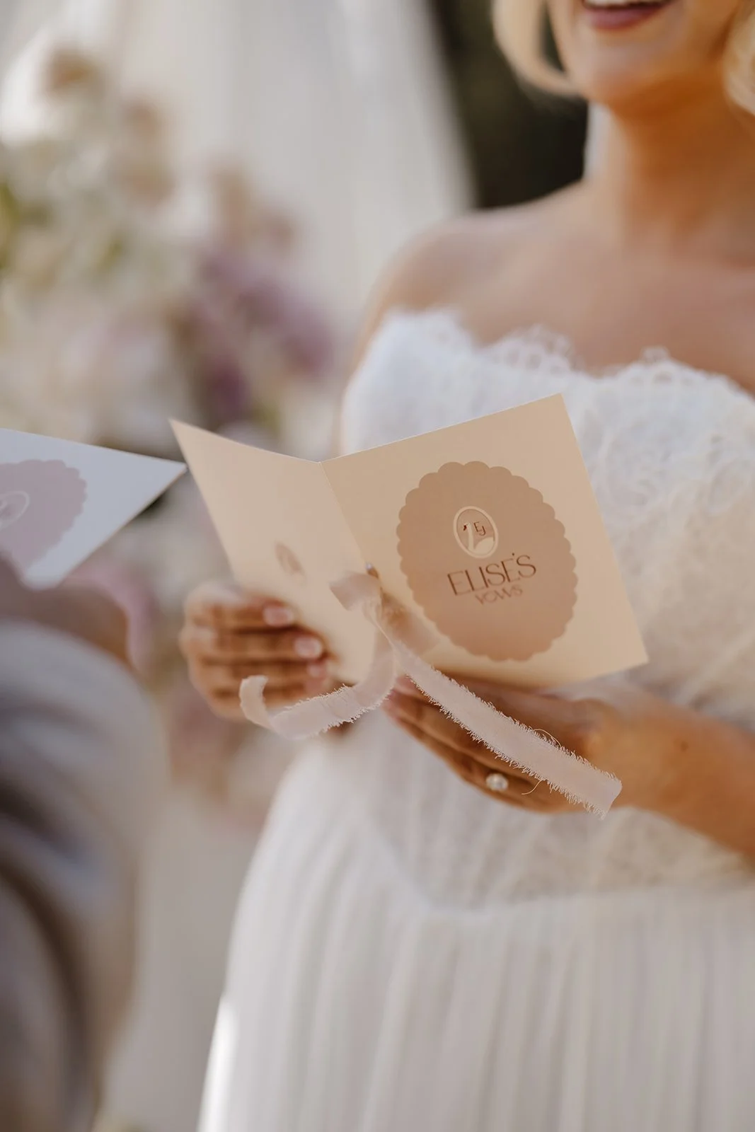 Luxury bespoke wedding vow books, featuring bespoke swan monogram, soft blush tones, and pure silk ribbon. Designed by Carrie at Honey Bee Mine, and captured at Capesthorne Hall.