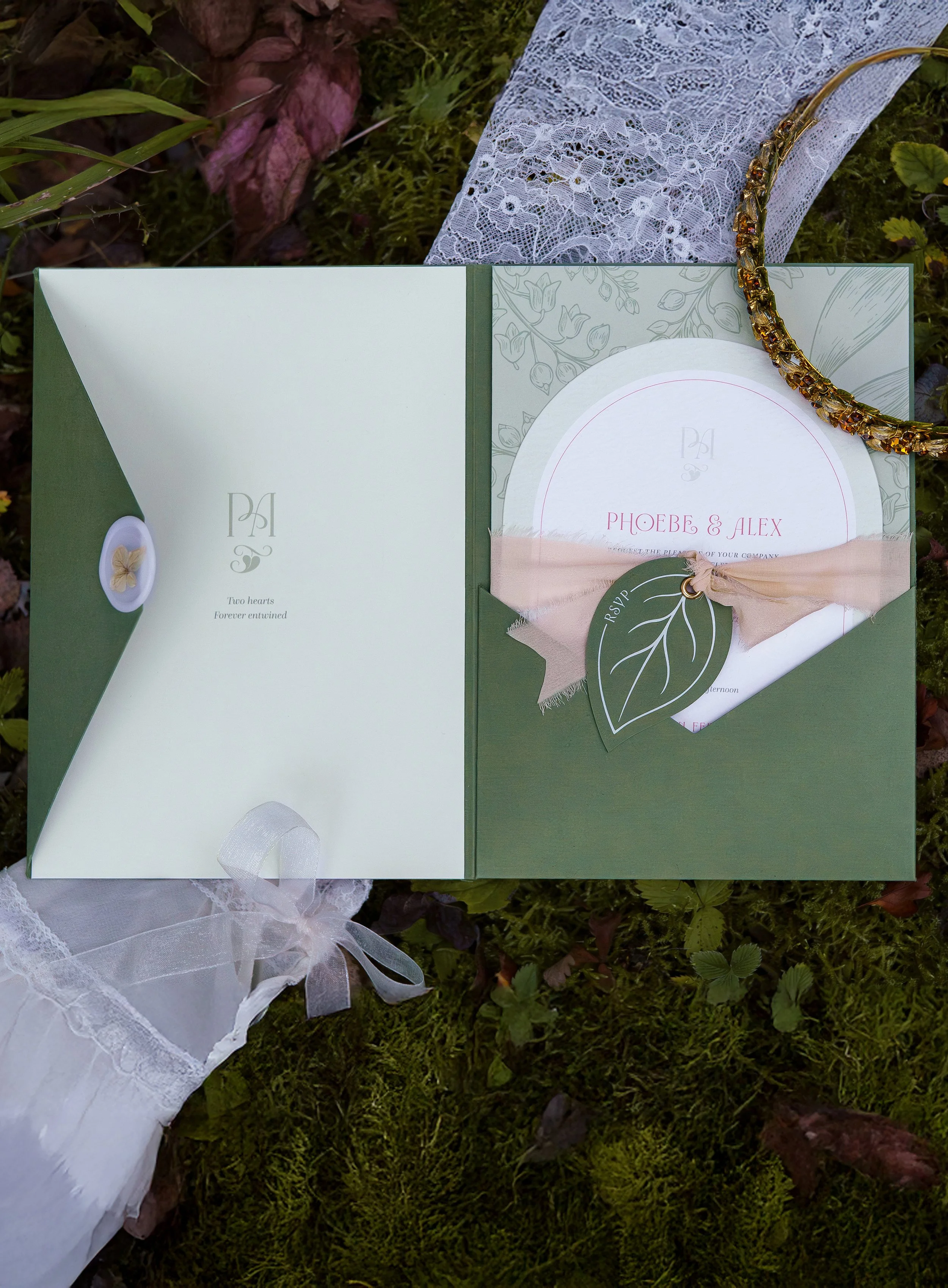 Organic luxury wedding stationery photographed among woodland foliage at Sylvan Ferns.