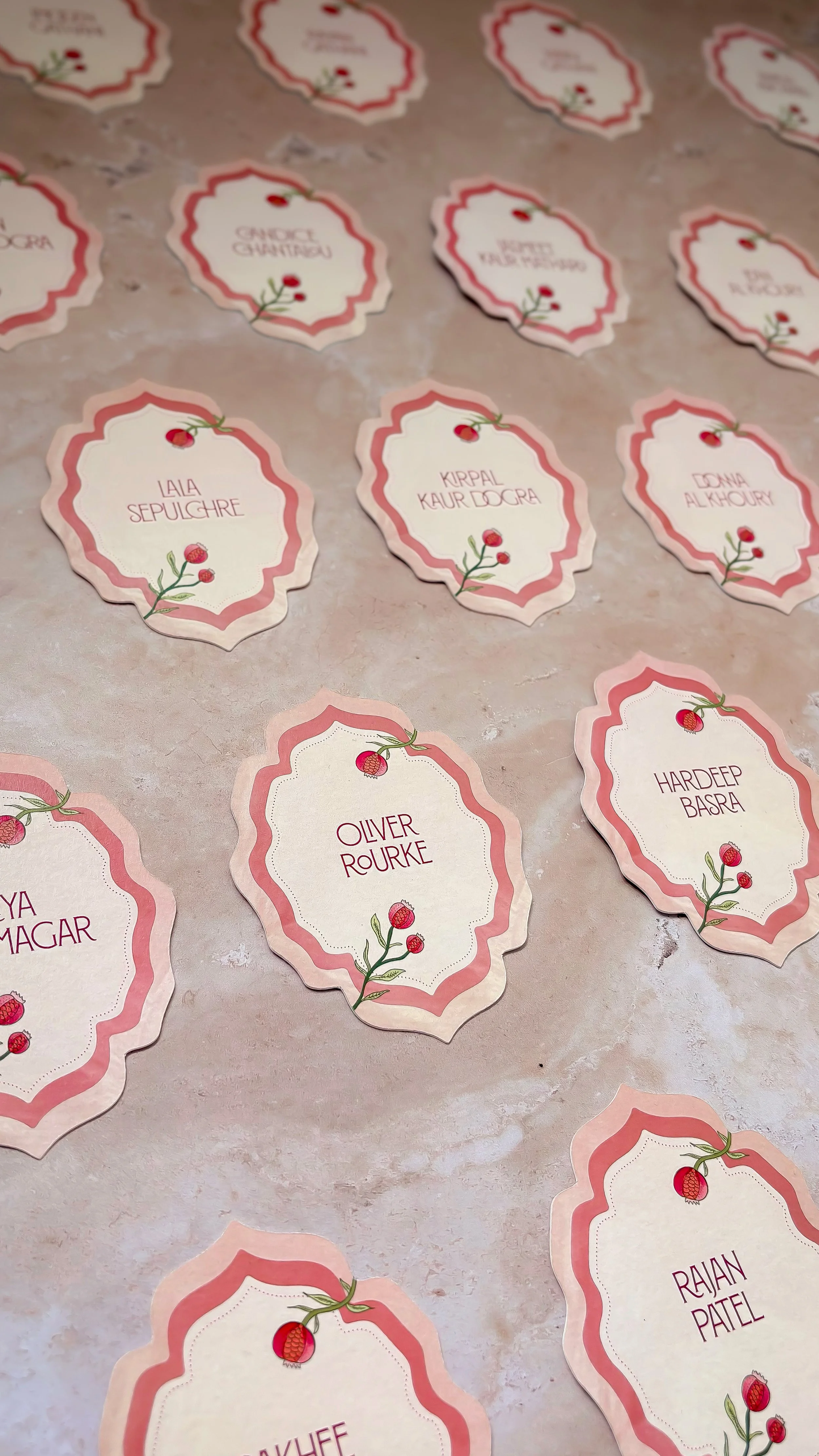 Die-cut wedding place cards created for a multi-day celebration at Kin House