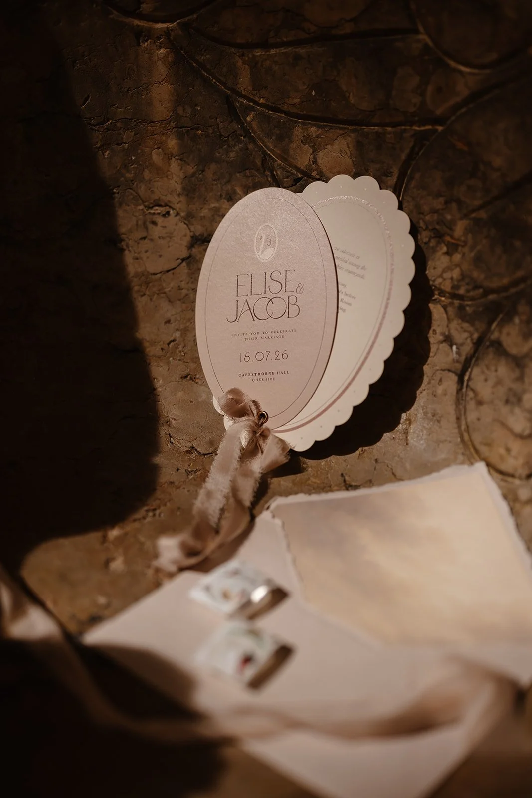 Luxury wedding invitation suite with hand illustrated swans, soft blush tones, scalloped edges and pure silk ribbon. Designed by Carrie at Honey Bee Mine, and captured at Capesthorne Hall.