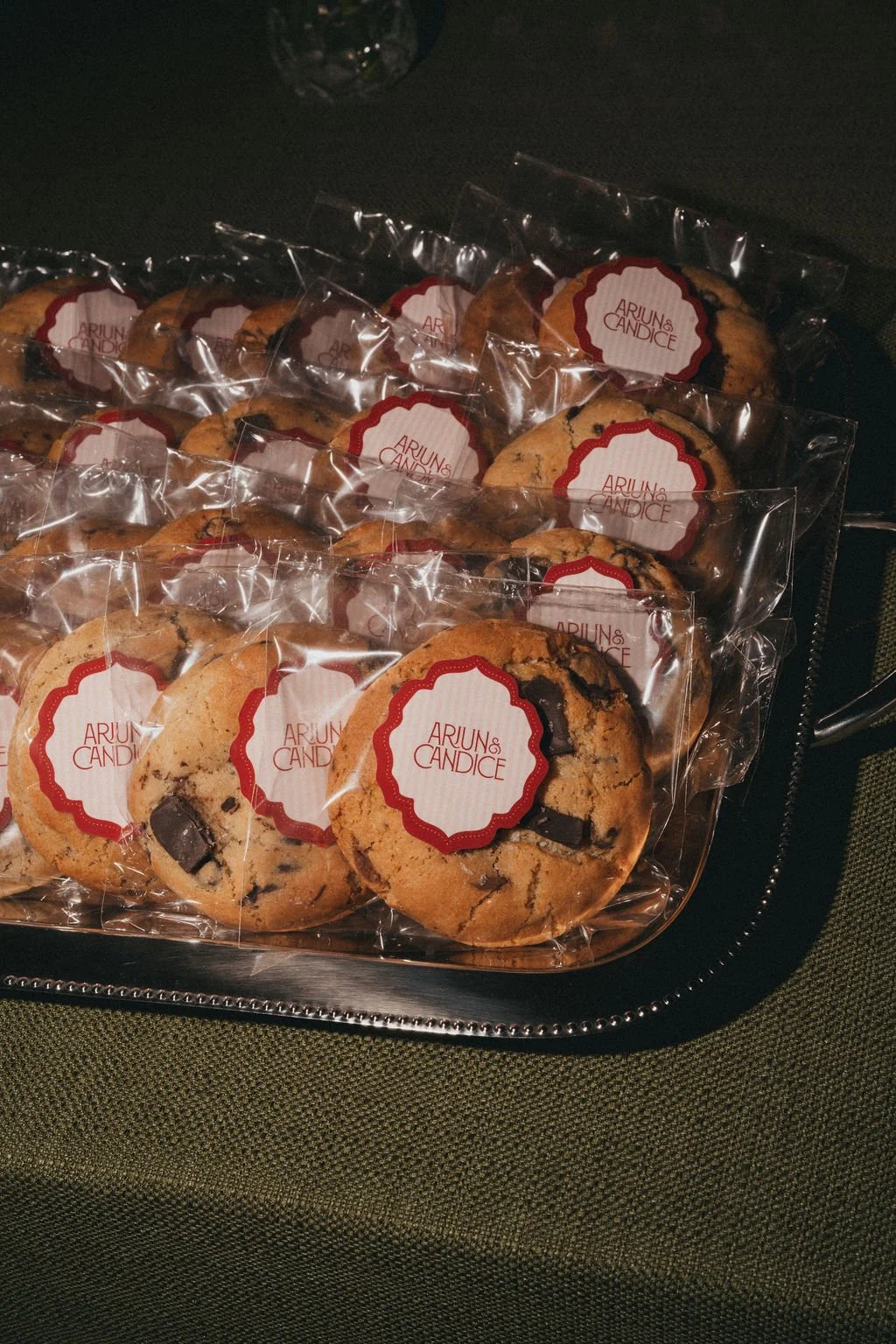 Individually wrapped wedding cookies with custom botanical stickers