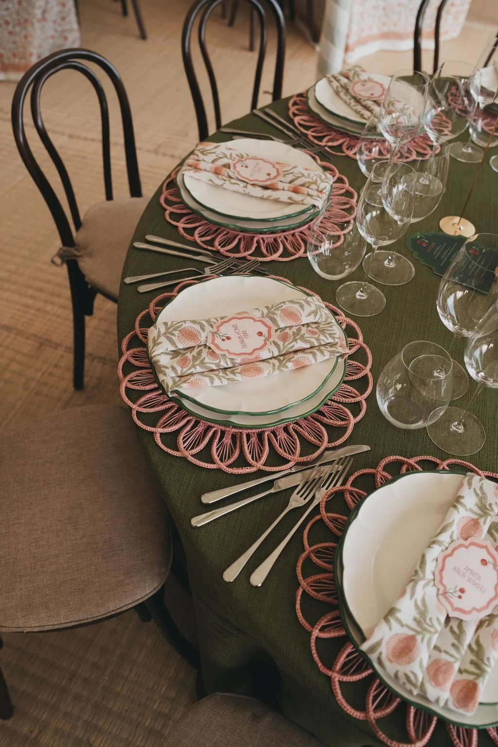 Elegant wedding place cards incorporating bespoke pomegranate illustration, styled for a wedding at Kin House.