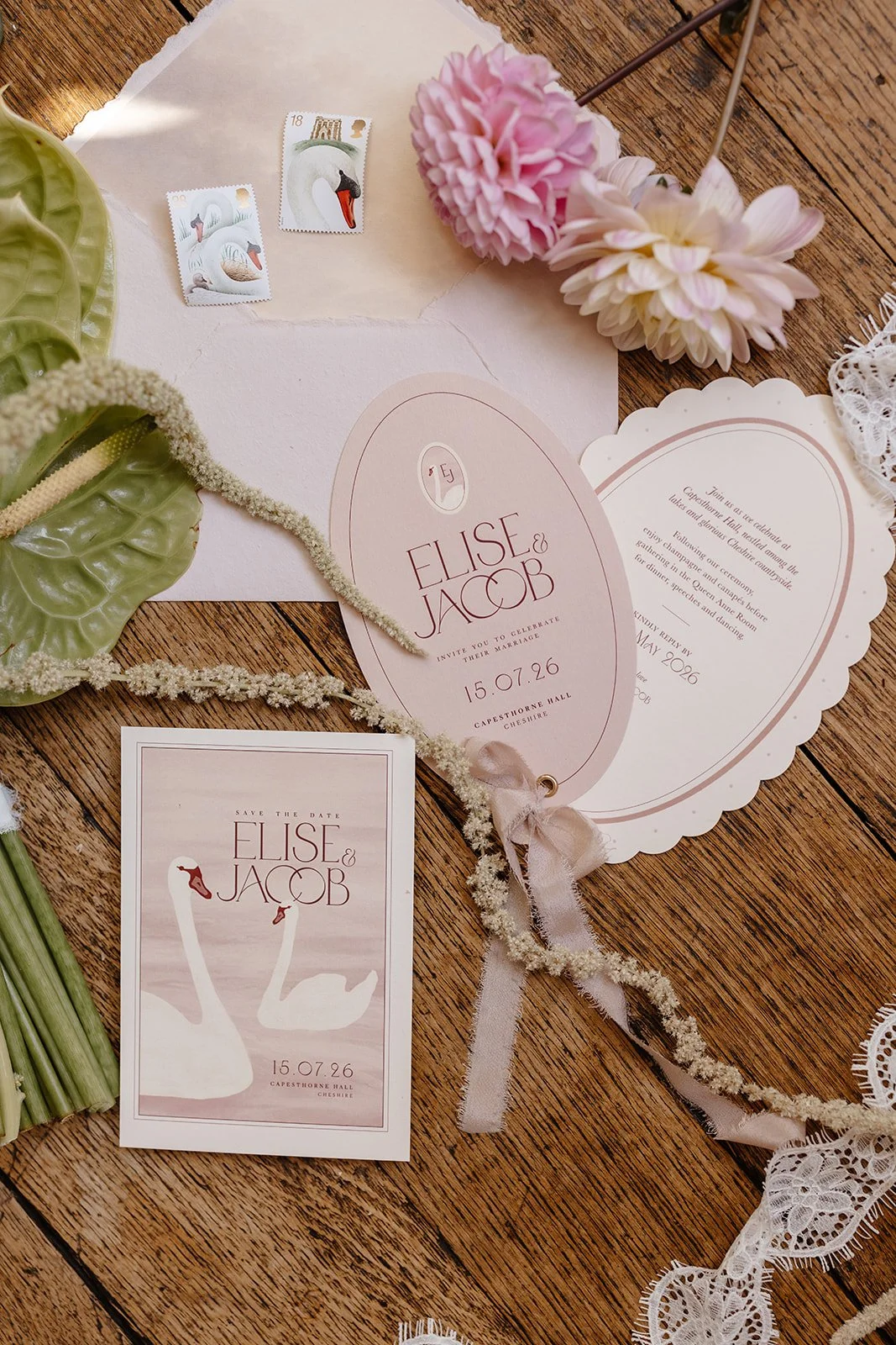 Luxury wedding invitation suite with hand illustrated swans, soft blush tones, scalloped edges and pure silk ribbon. Designed by Carrie at Honey Bee Mine, and captured at Capesthorne Hall.