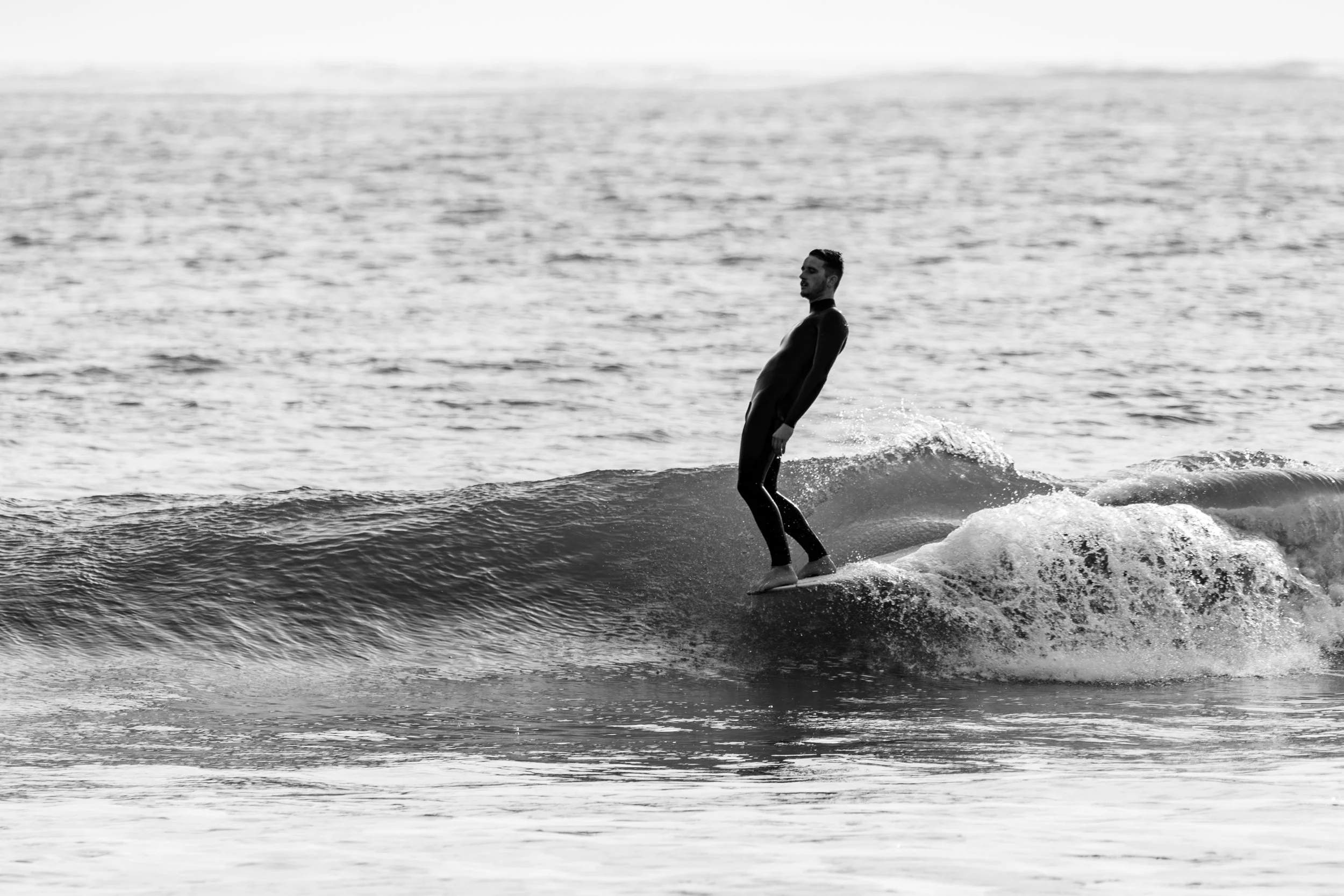 black and white noseride longboard devon ben haworth.jpg
