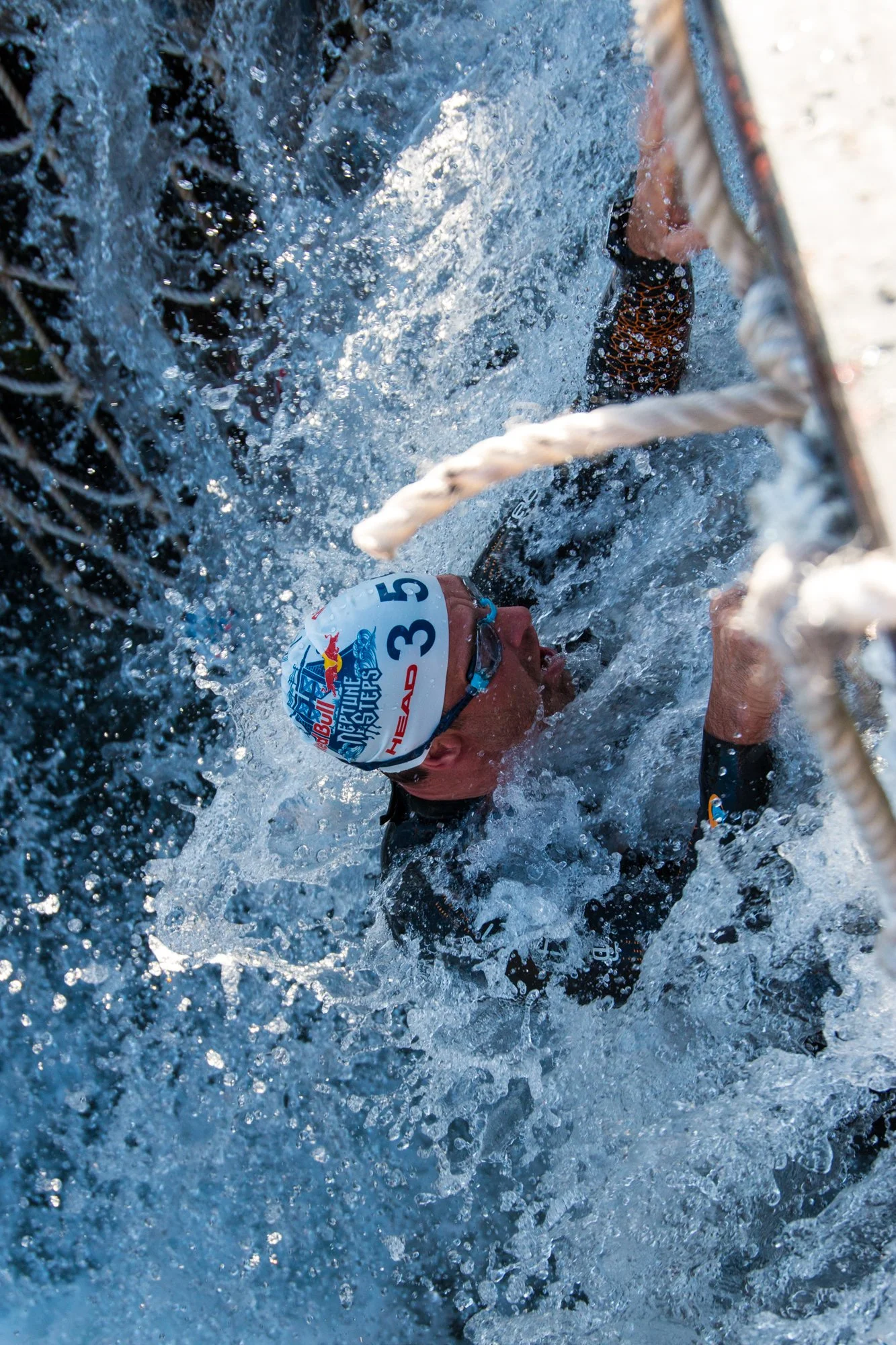 red bull neptune steps swimmer climbing.jpg