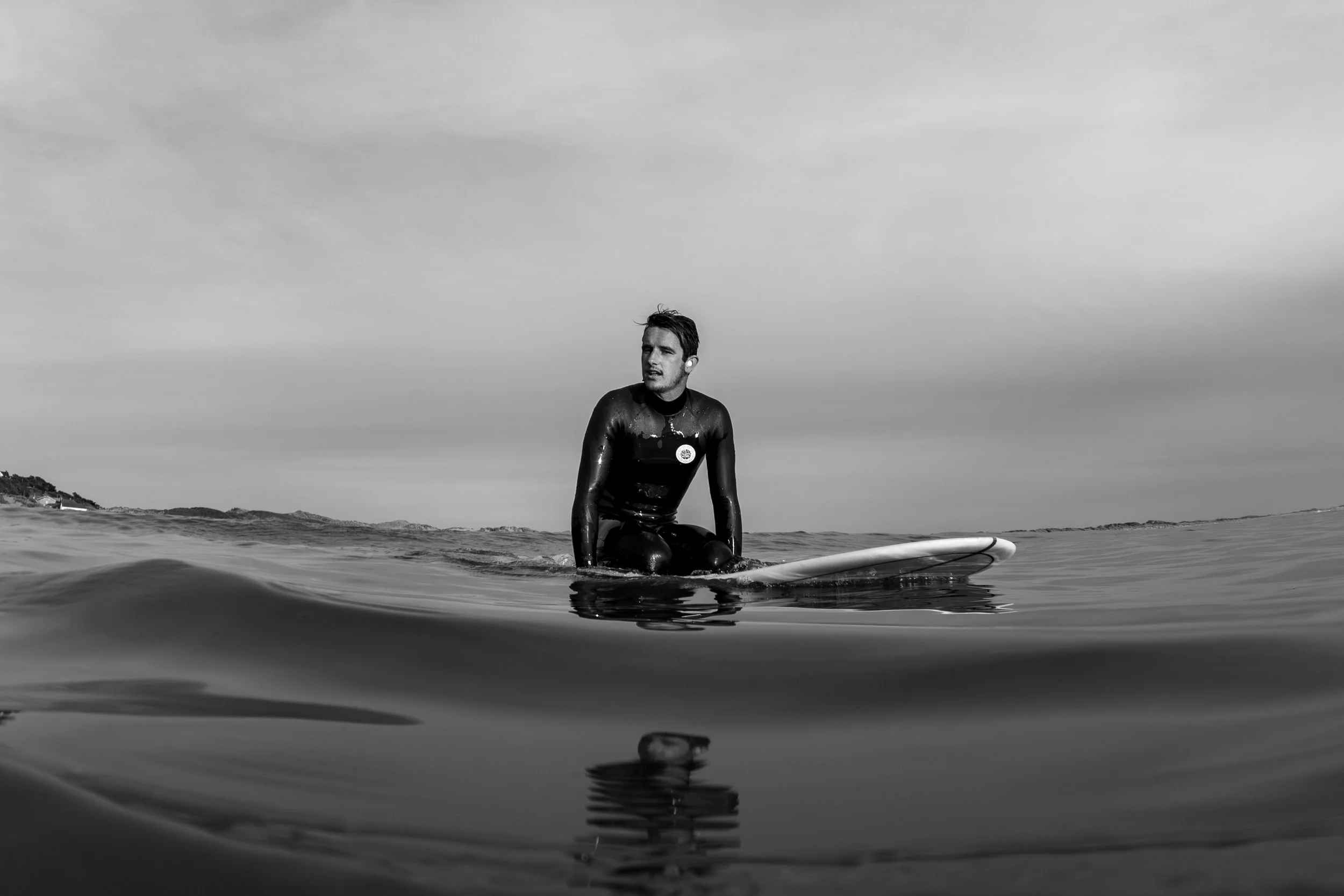 black and white portrait surfer longboard.jpg