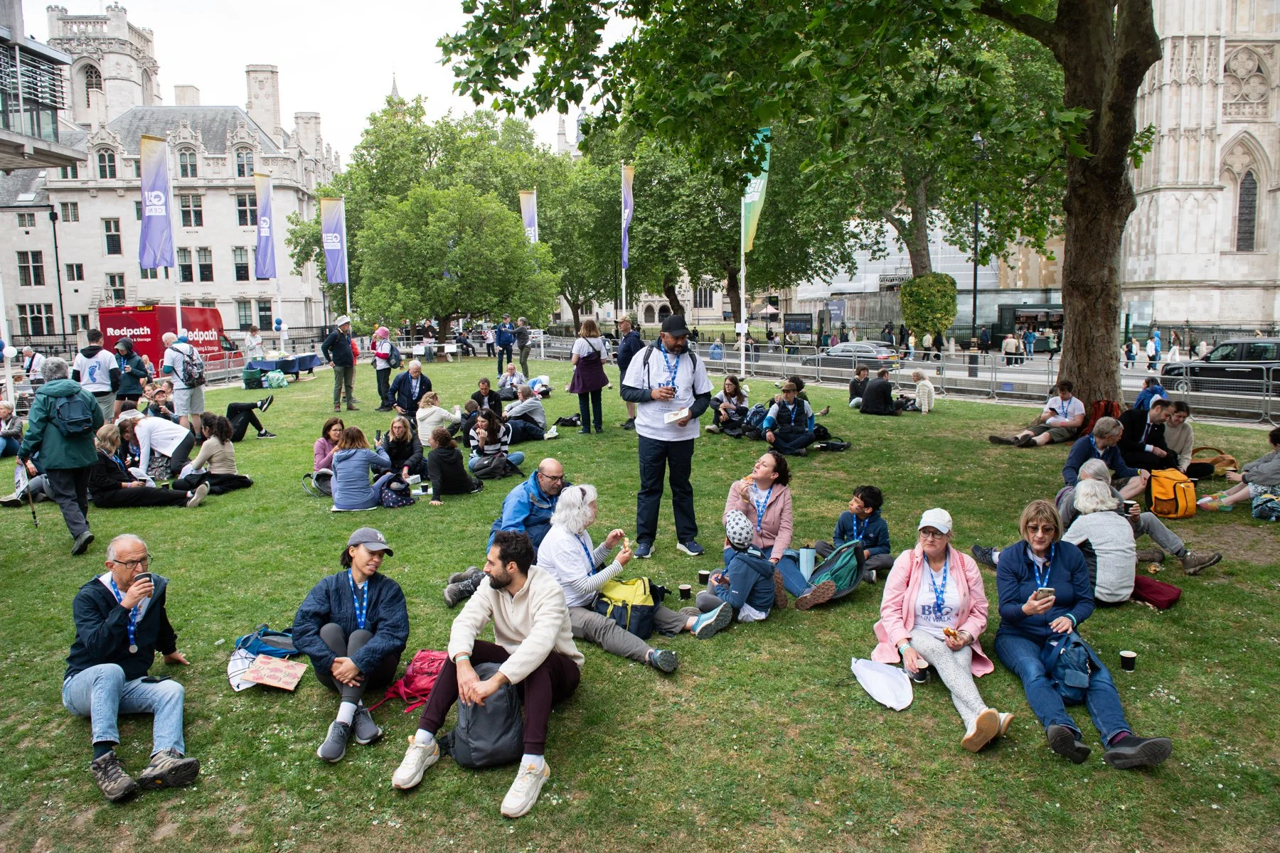 Walkers resting in QEII Centre grounds