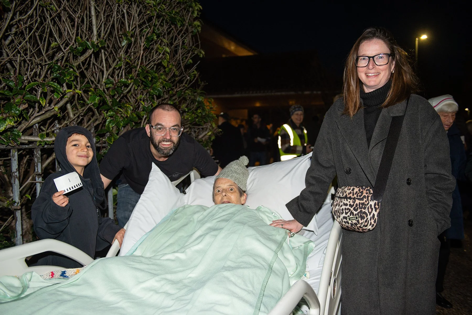 Family and Hospice patient pose for a picture