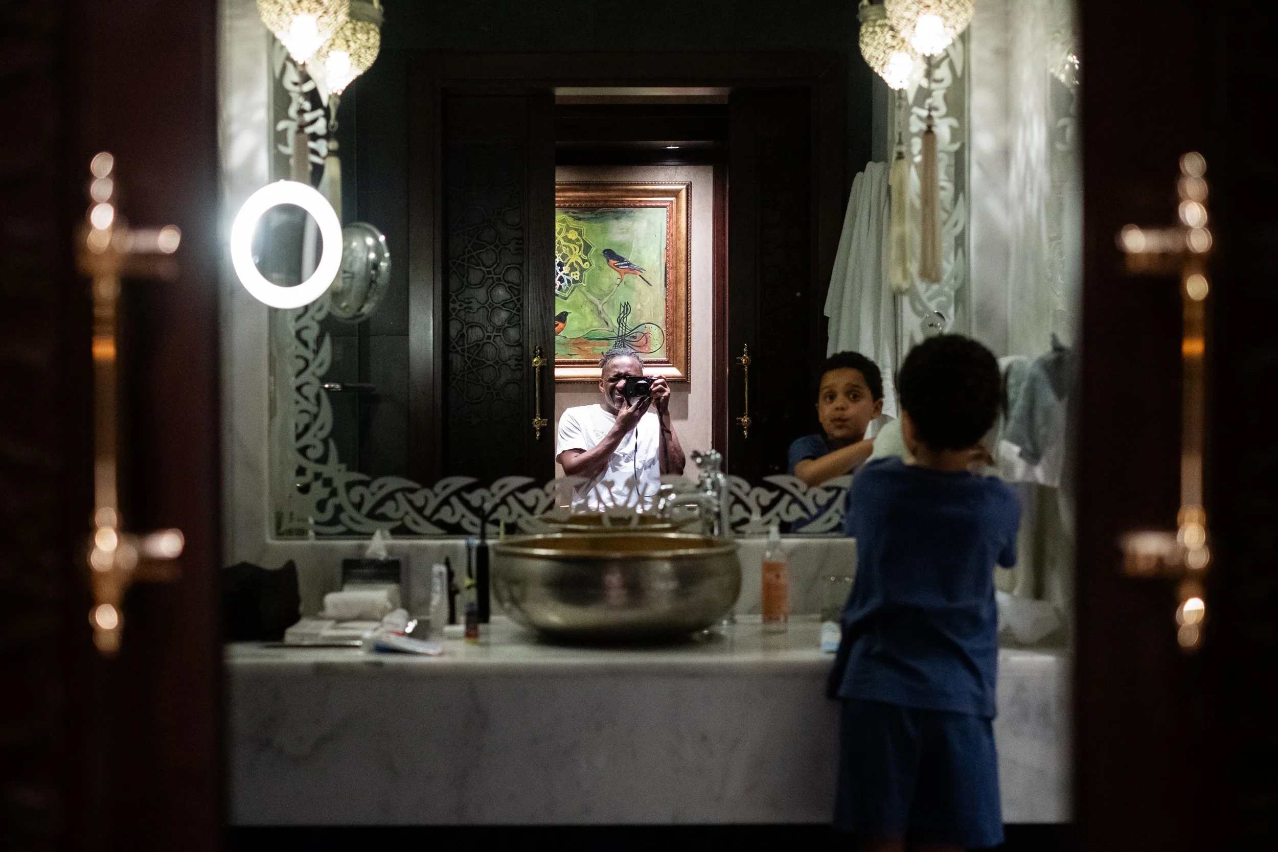 Ian Kiffin capturing his son Miles in hotel room