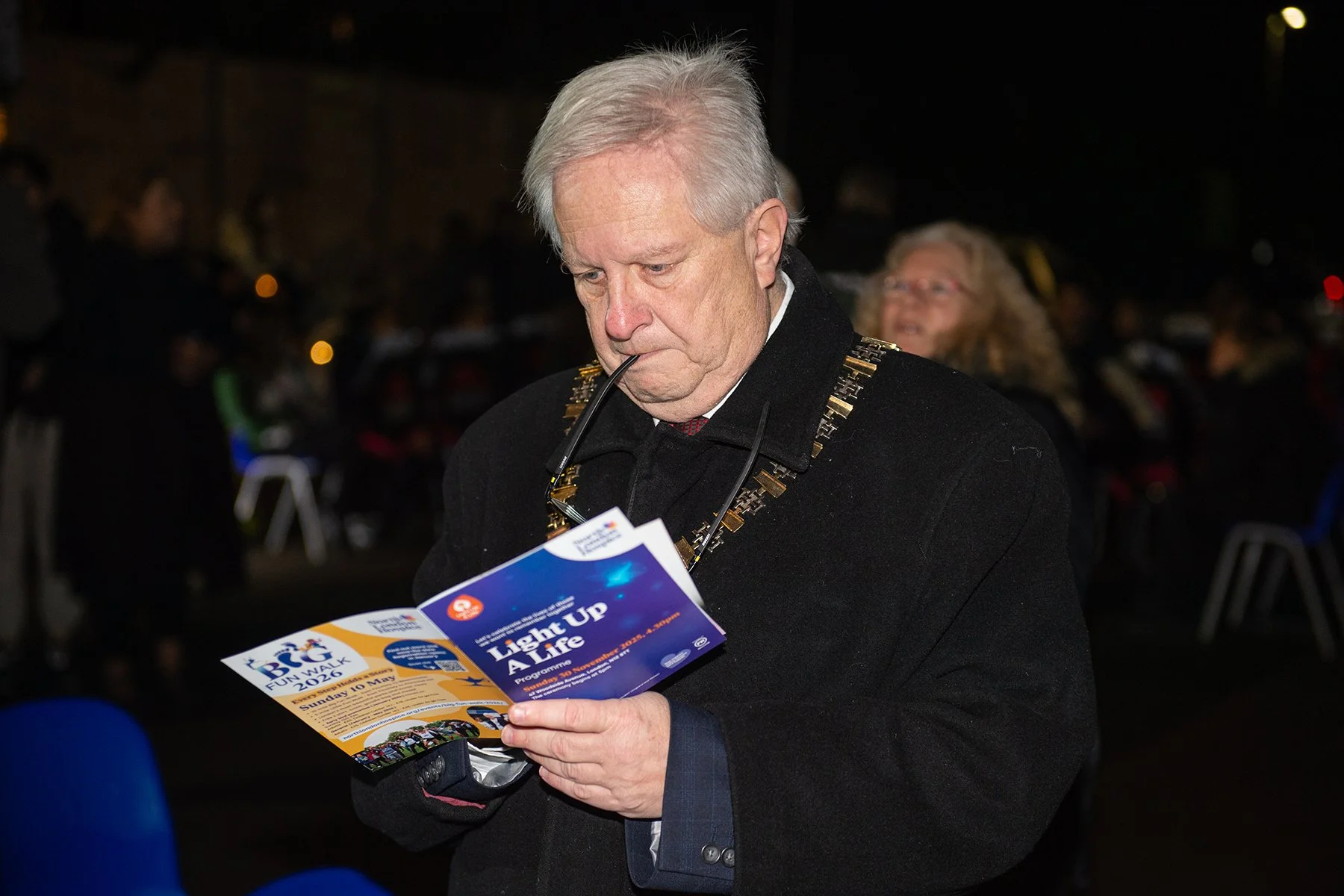 Local Mayor reading Light Up A Life leaflet