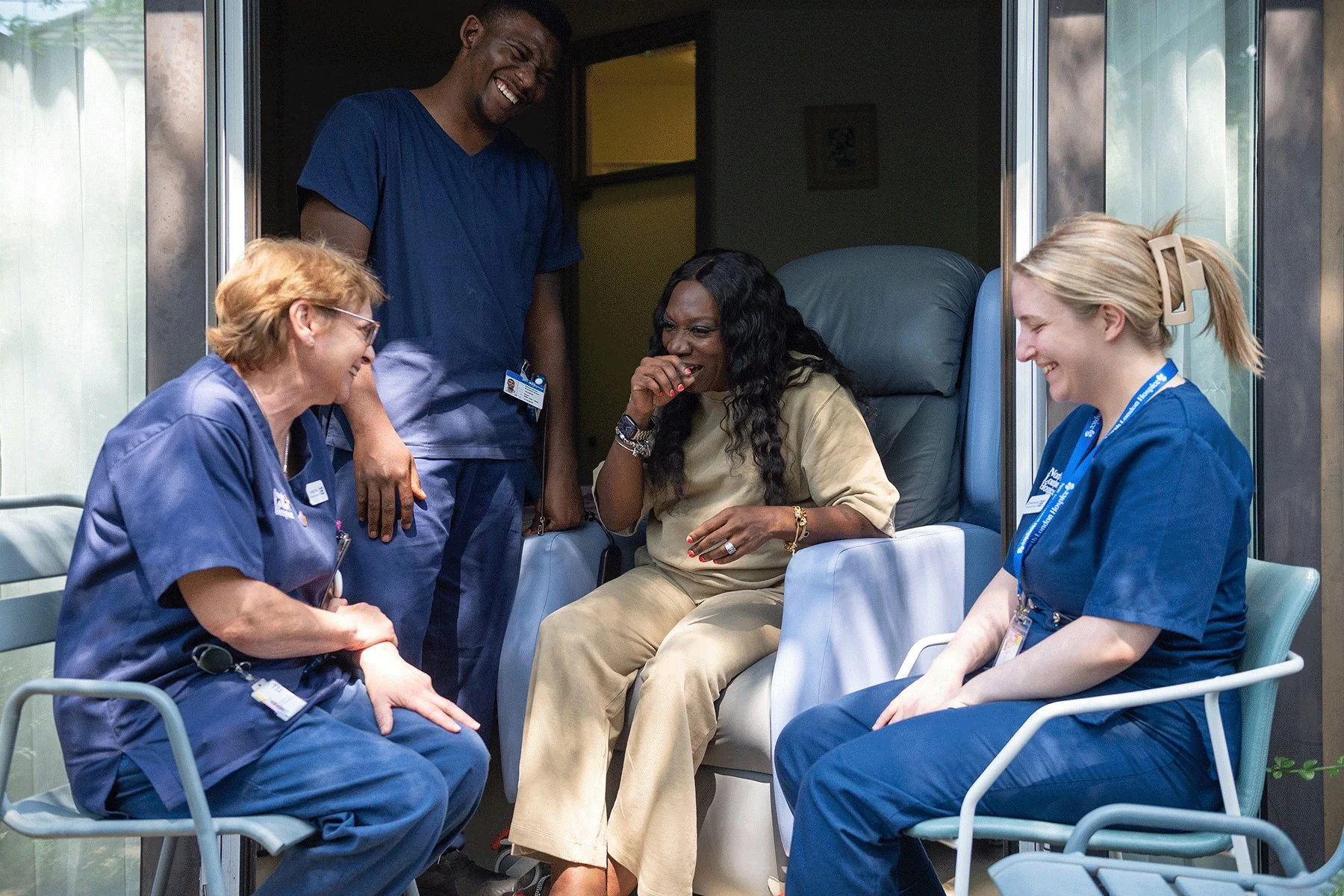 Staff and patient laugh at North London Hospice