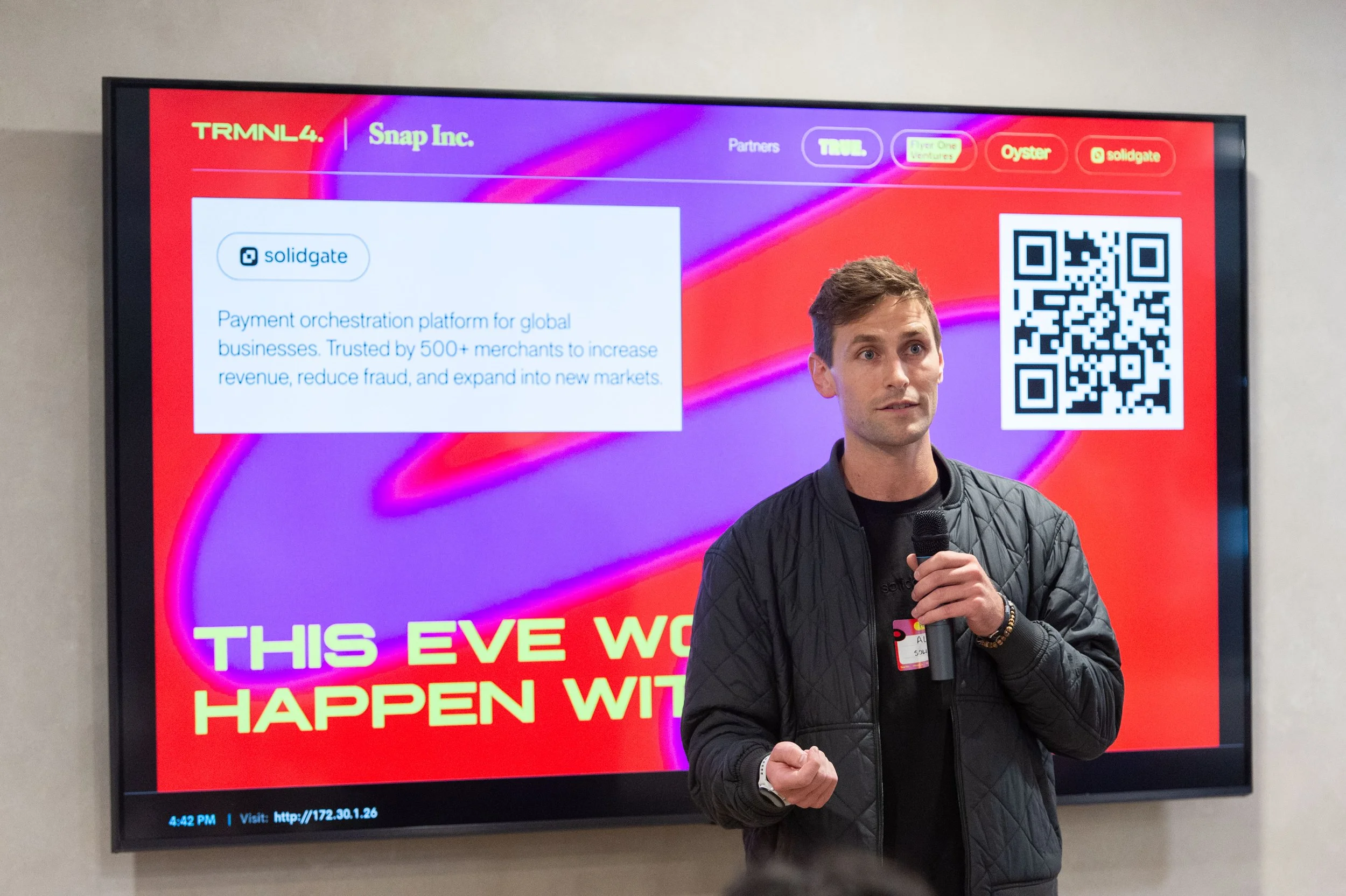 Investor and founder of Solidgate addresses the audience