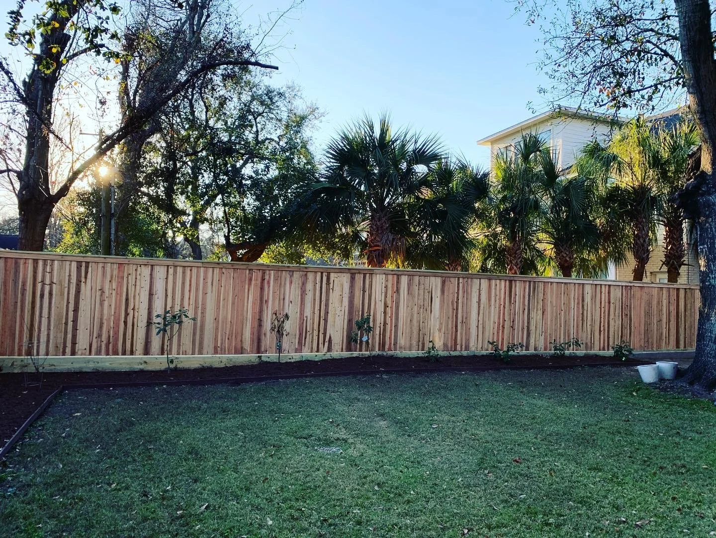 Custom cedar privacy fence installed in Olive Branch, MS by DeSoto Fence Co.