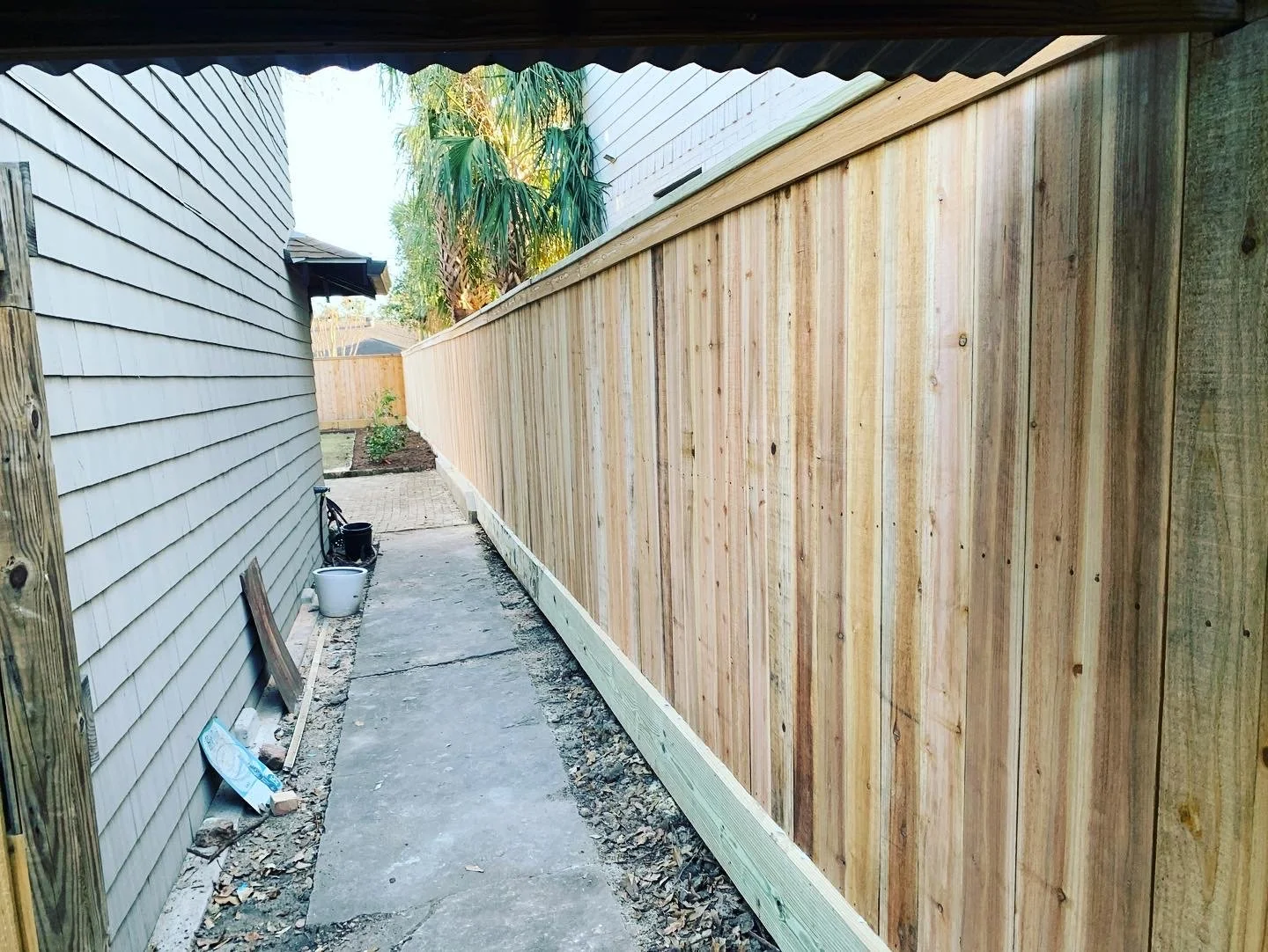 Custom cedar privacy fence installed in Olive Branch, MS by DeSoto Fence Co.