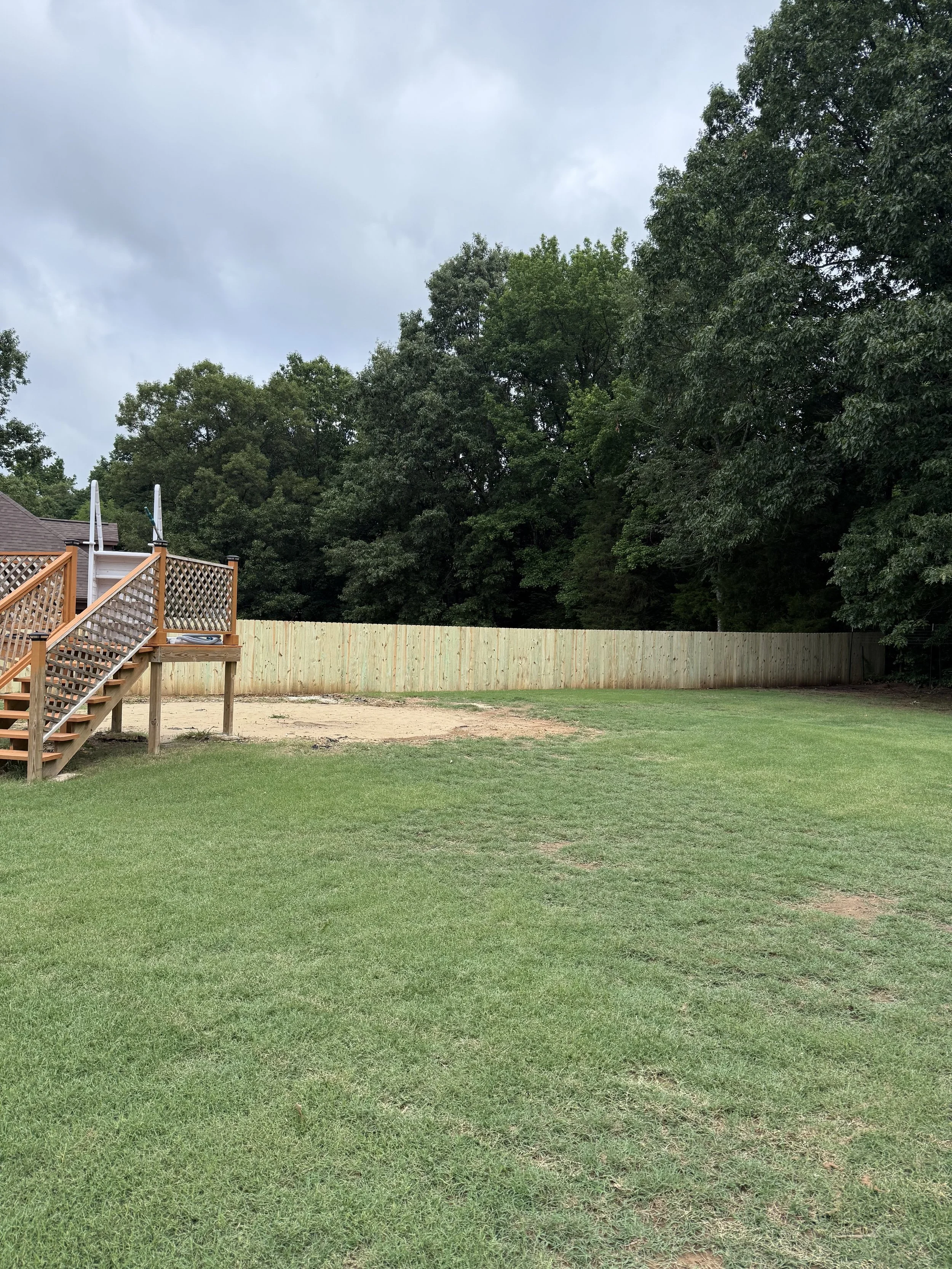 Pressure treated pine privacy fence installed in Hernando, MS by DeSoto Fence Co.