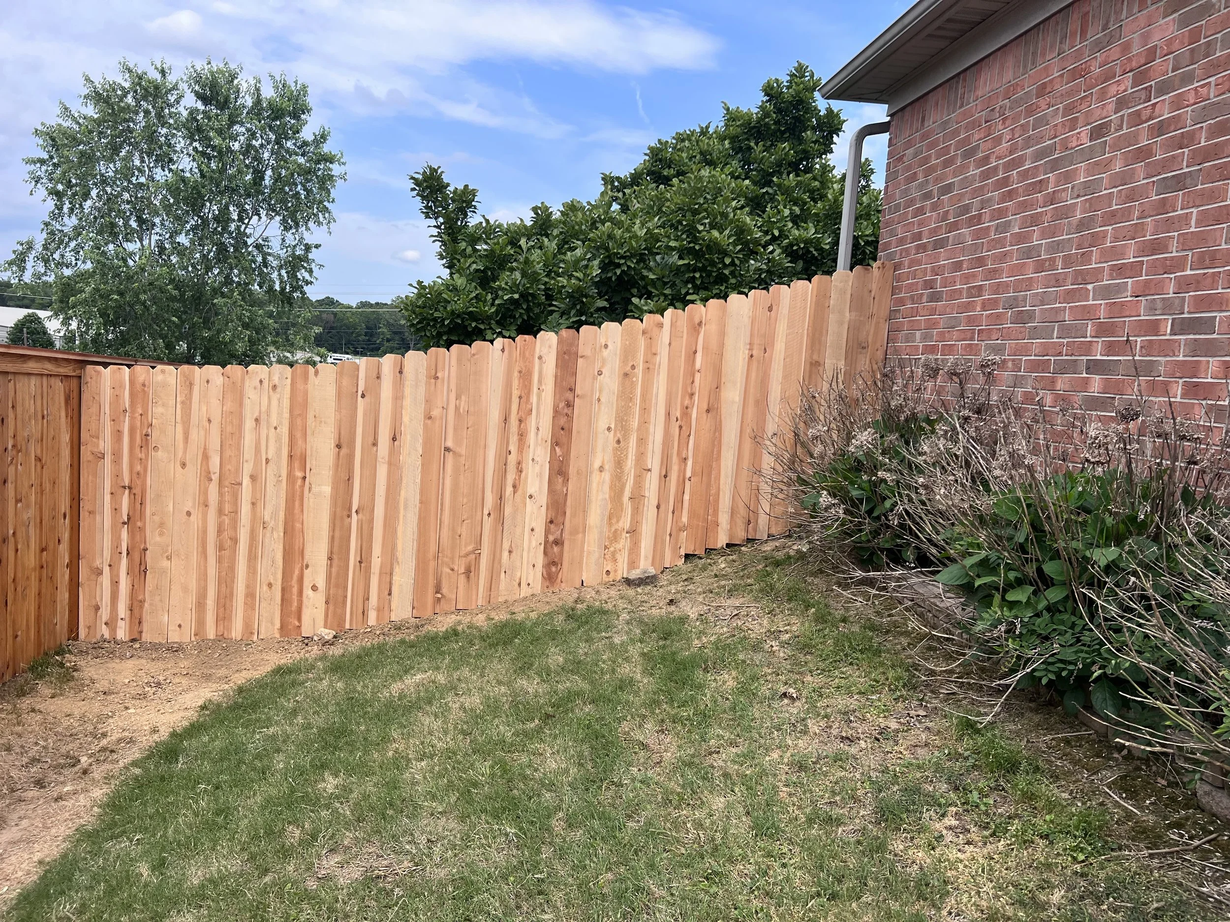 Cedar wood privacy fence built in Olive Branch, MS by DeSoto Fence Co.