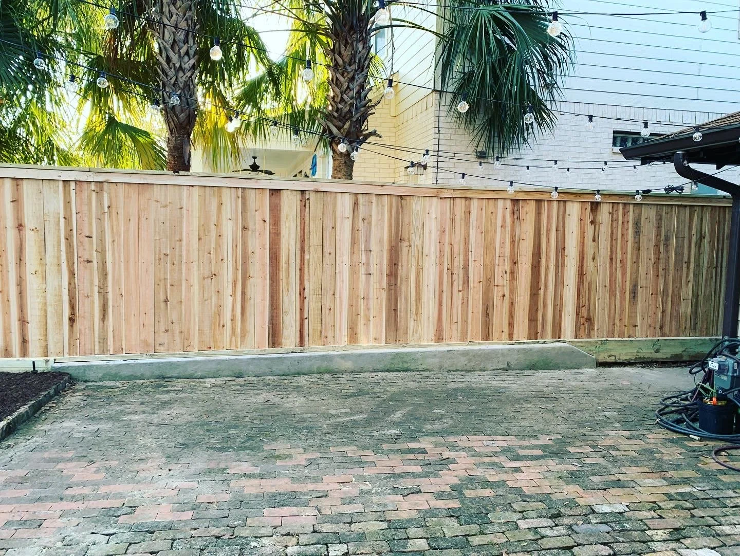 Custom cedar privacy fence installed in Olive Branch, MS by DeSoto Fence Co.
