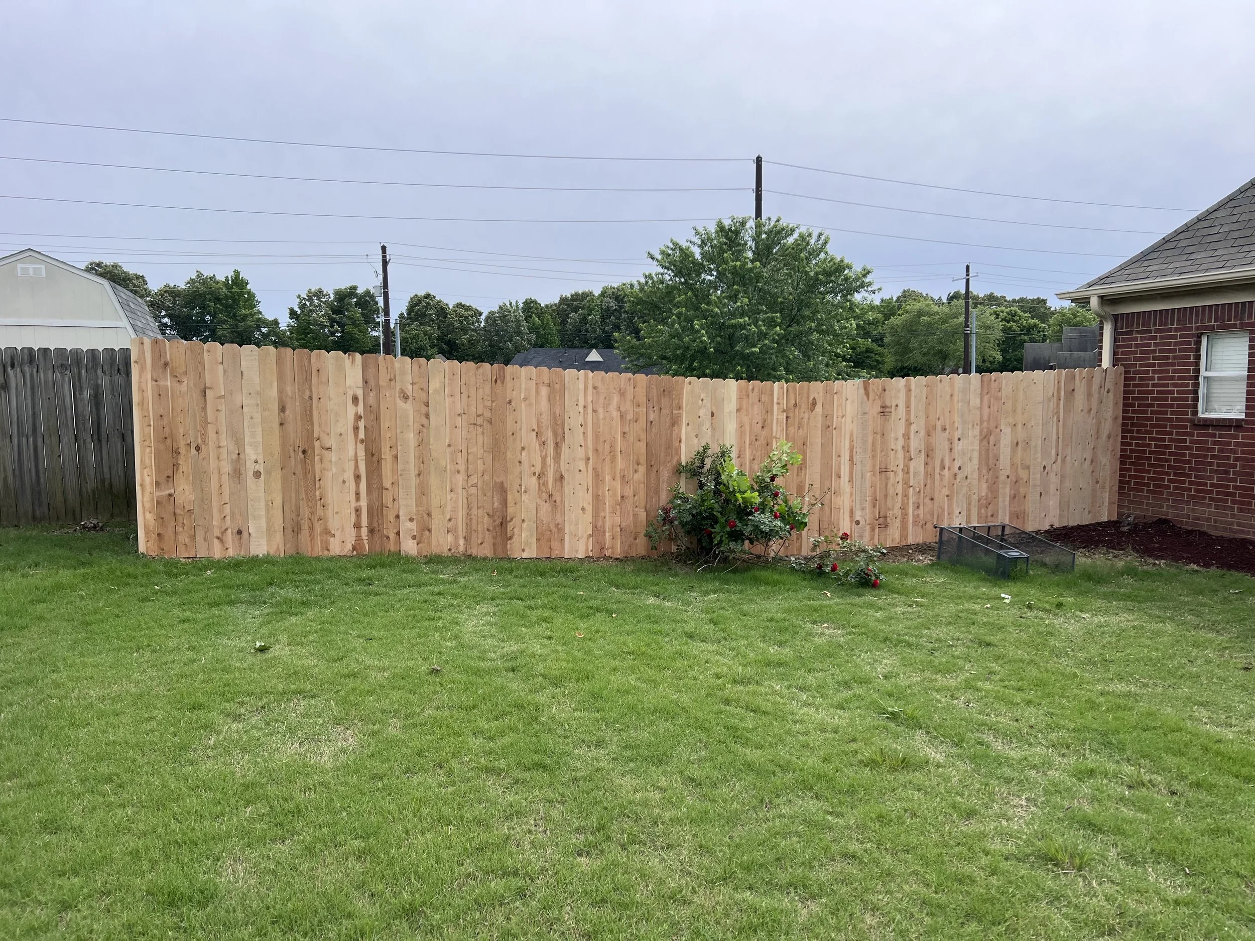 Premium cedar privacy fence built in Southaven, MS by DeSoto Fence Co.