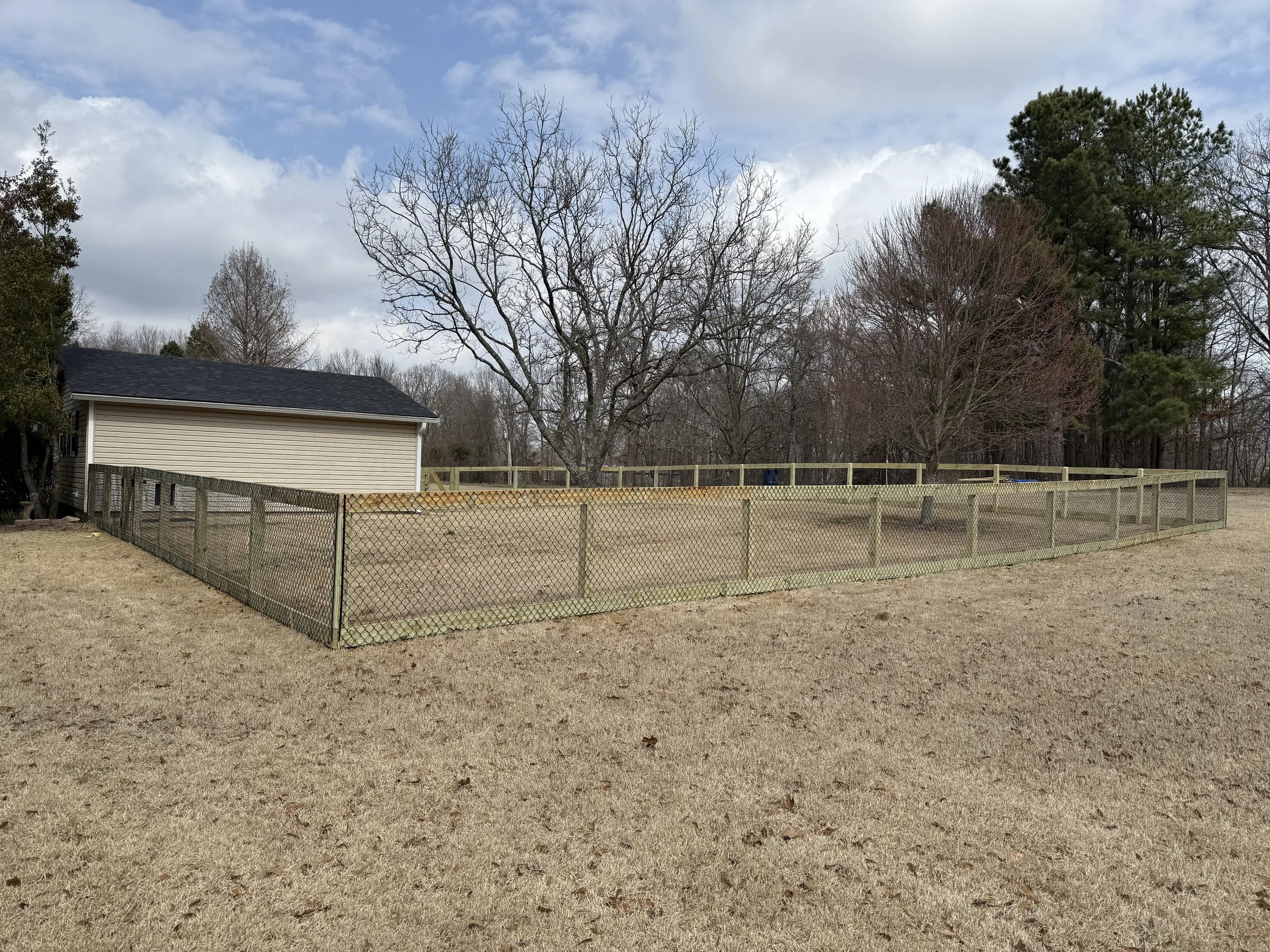 Black California chain link fence built in Hernando, MS by DeSoto Fence Co.