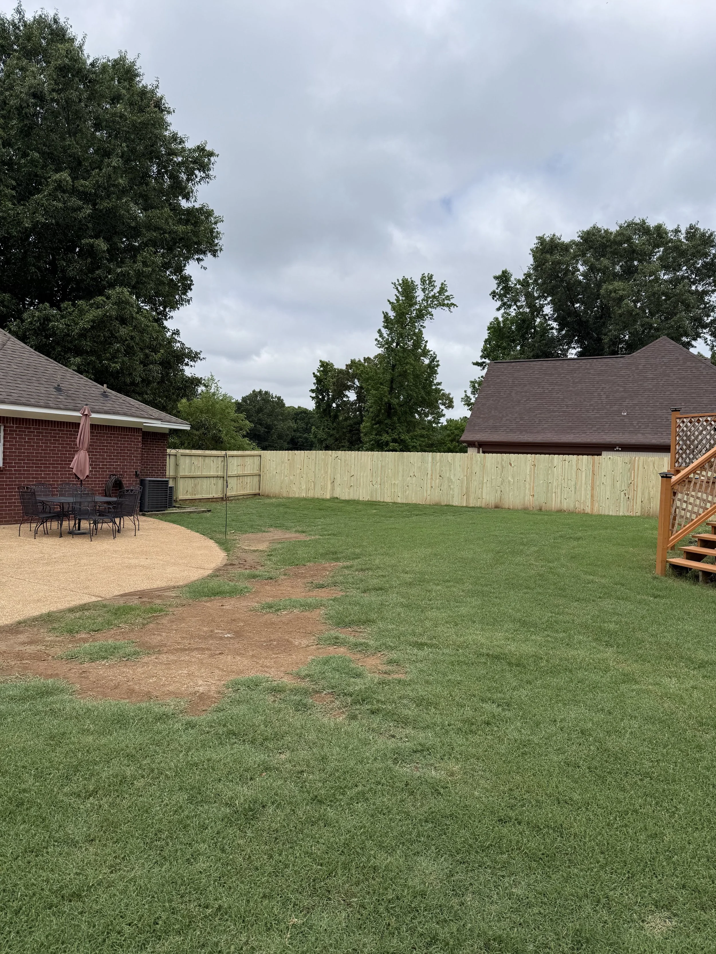 Pressure treated pine privacy fence installed in Hernando, MS by DeSoto Fence Co.