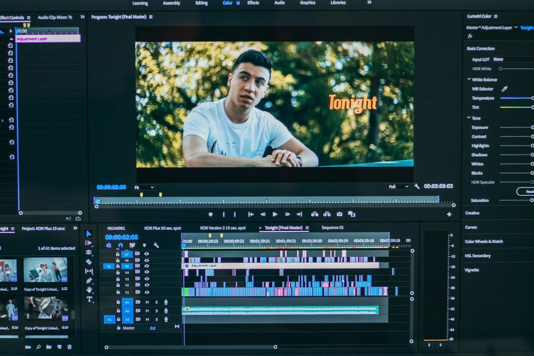 Video editing software on a computer screen showing a timeline, clips, and editing tools, with a video of a young man outdoors with trees in the background, and the word 'Tonight' overlaid.