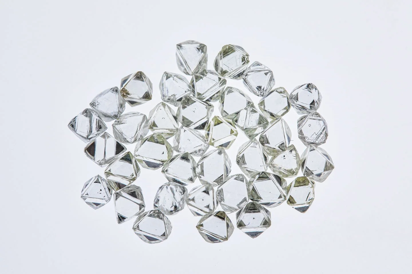 Natural vs Lab-Grown Diamond Crystals - which one catches your eye? 💎

In the first photo, we have stunning octahedral diamond crystals straight from nature. The second photo showcases a laboratory as-grown diamond crystal formed using the CVD (carb
